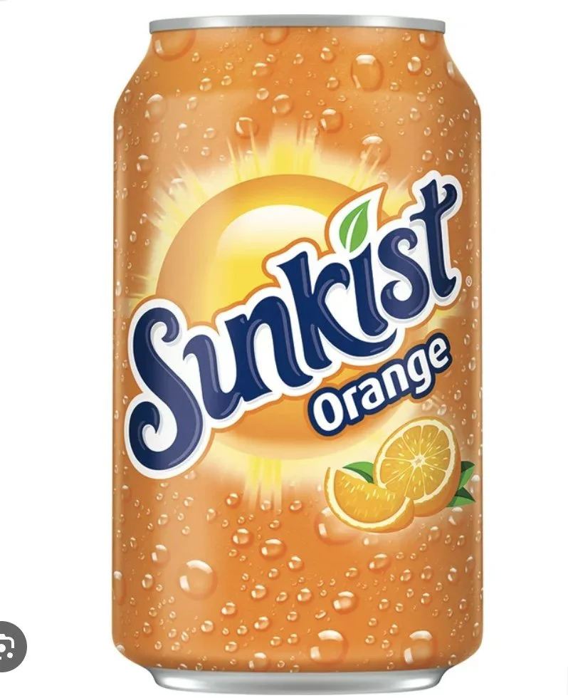 Cans of Sunny Delight Orange flavored beverage with droplets design and a sliced orange illustration.