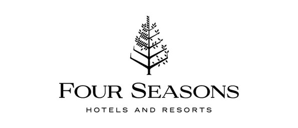 Logo with a stylized tree and the text "Four Seasons" beneath it.