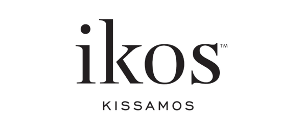 Logo with the word 'ikos' in large lowercase letters and 'KISSAMOS' in smaller lowercase letters below it.