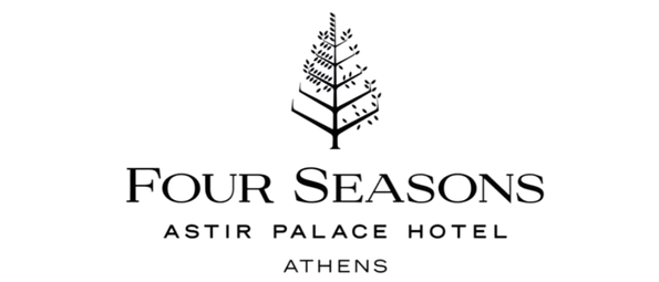 Logo of Four Seasons Astir Palace Hotel Athens, featuring a stylized evergreen tree above the hotel name.