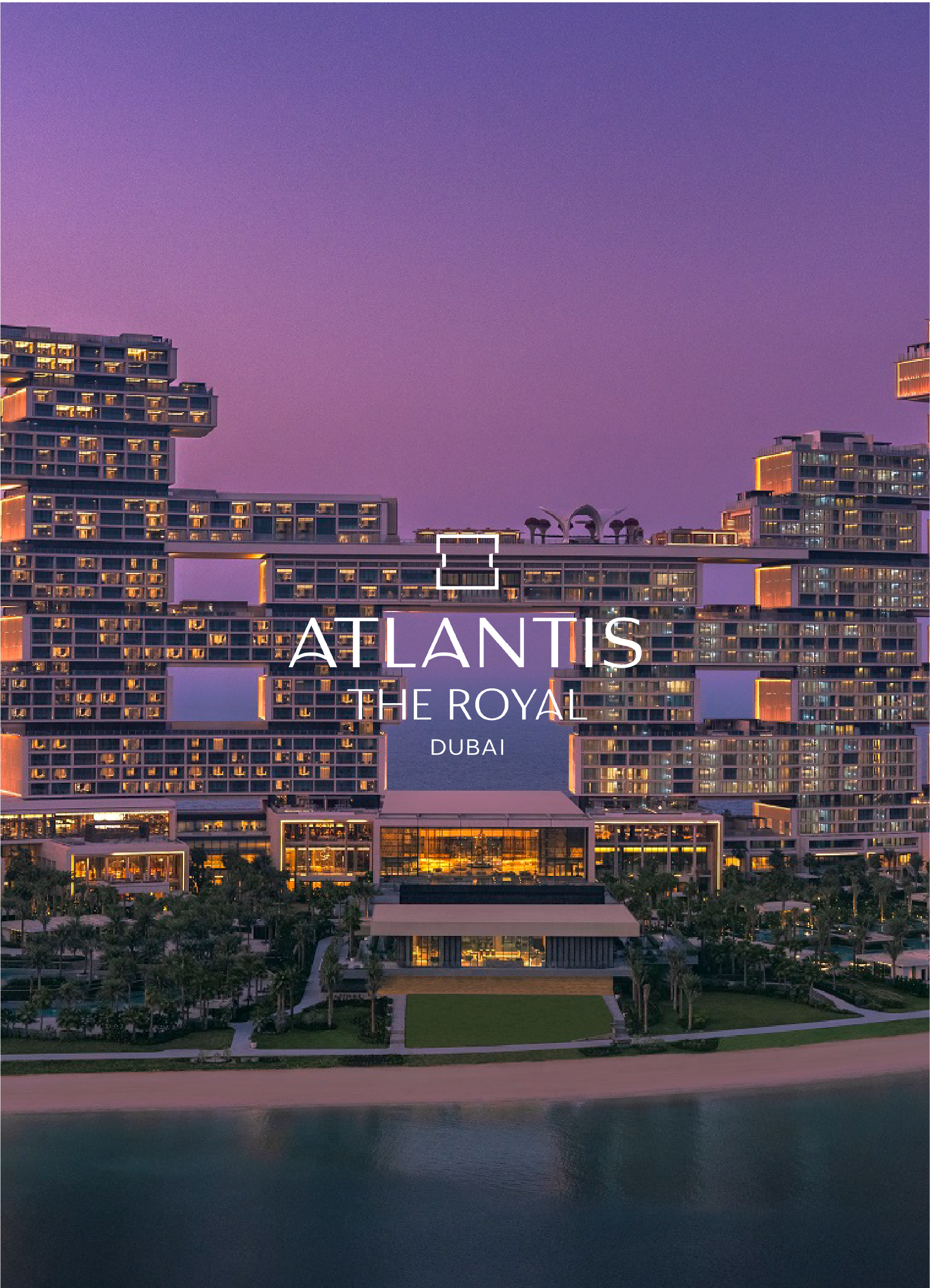 Nighttime view of Atlantis The Royal hotel in Dubai with illuminated modern architecture reflecting on water, purple sky