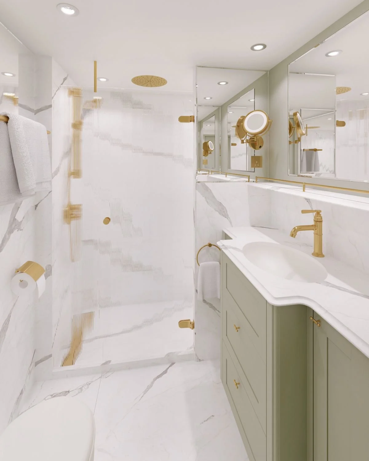 A luxurious modern bathroom with a white marble countertop, green cabinetry, gold fixtures, and a mirrored wall with makeup mirrors. There is a glass shower with gold accents, a white toilet, and white towels on a wall-mounted towel rack.
