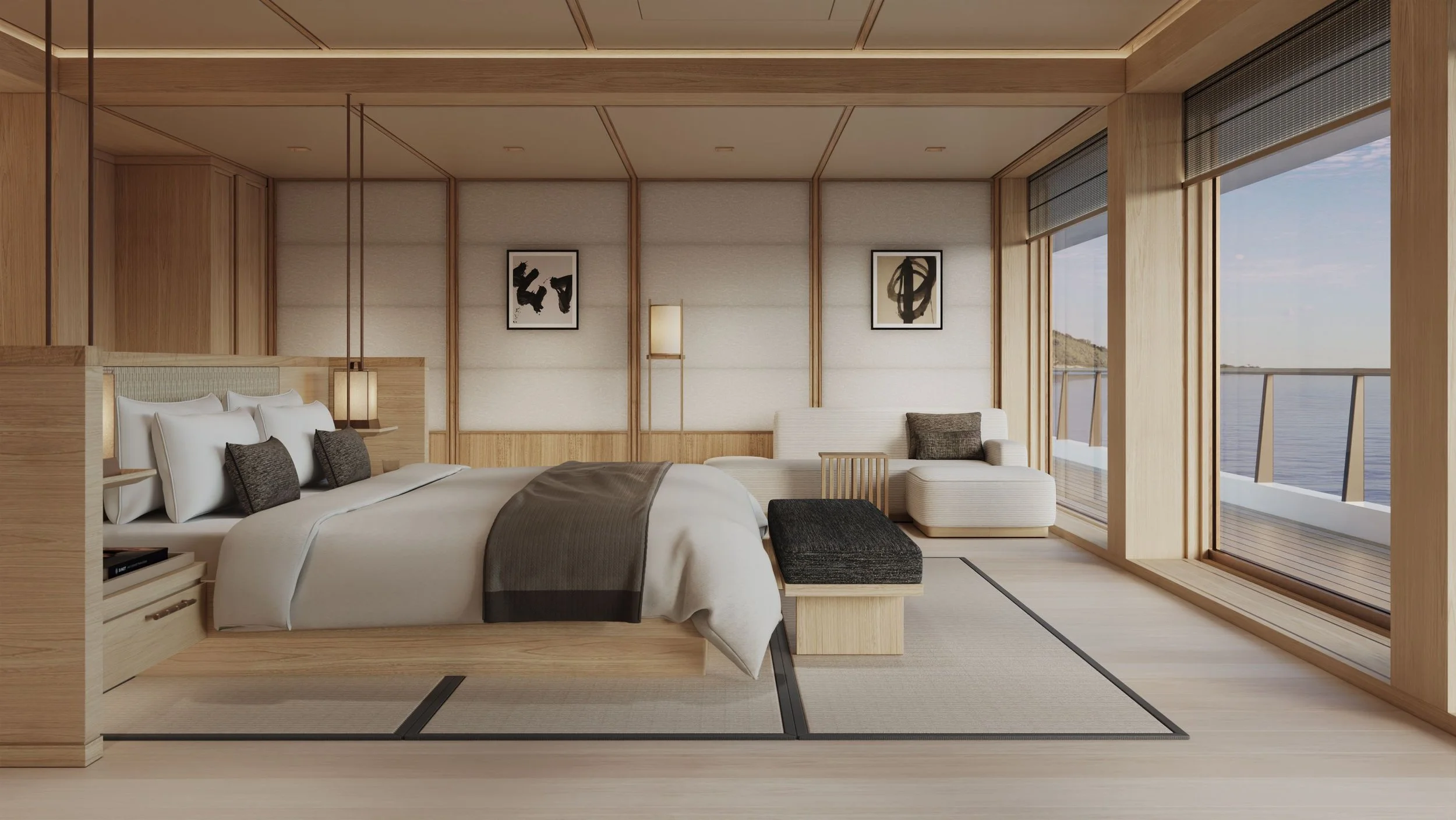 Modern bedroom with large windows overlooking water, featuring a white bed with white and black pillows, wooden furniture, and abstract black-and-white artwork on the walls.