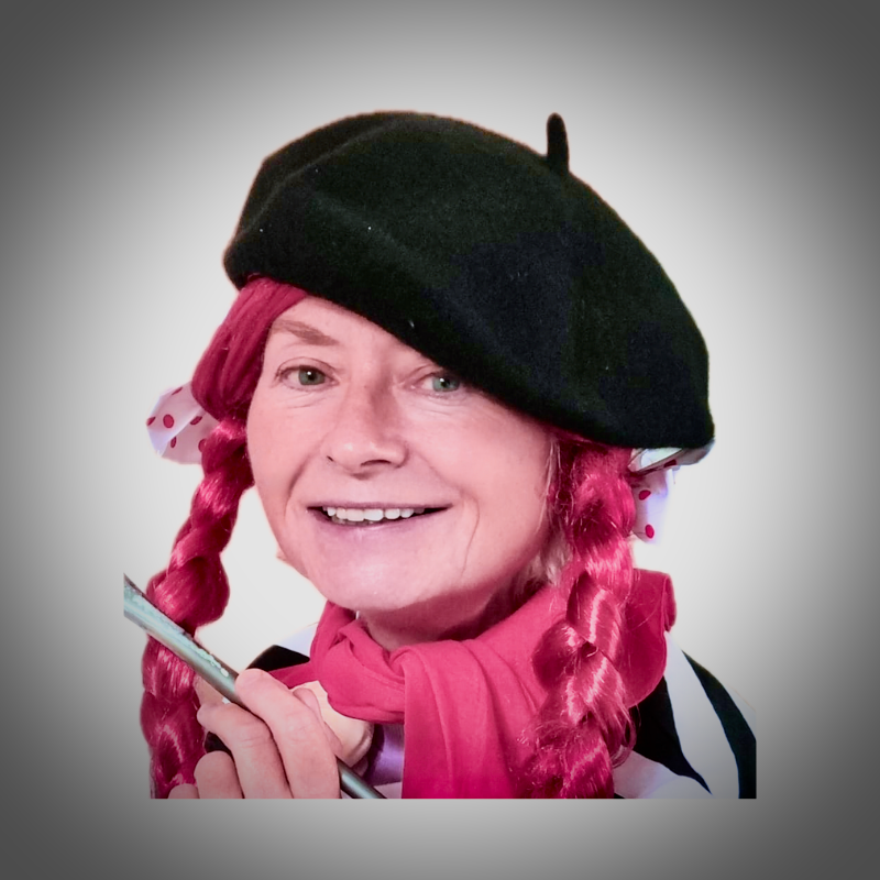 Head & Shoulders Portrait of a smiling woman's face looking at the viewer with braided hair, a black beret and red scarf holding a paintbrush