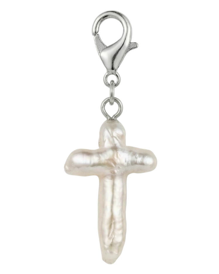 A pearl pendant in the shape of a cross with a silver clasp.