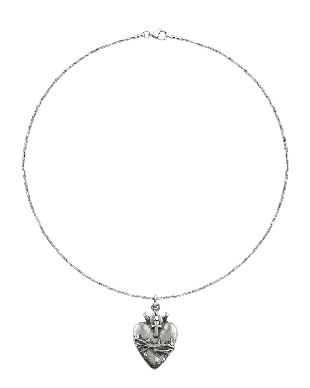 Silver necklace with a large heart-shaped pendant featuring a small cross and angel horns.
