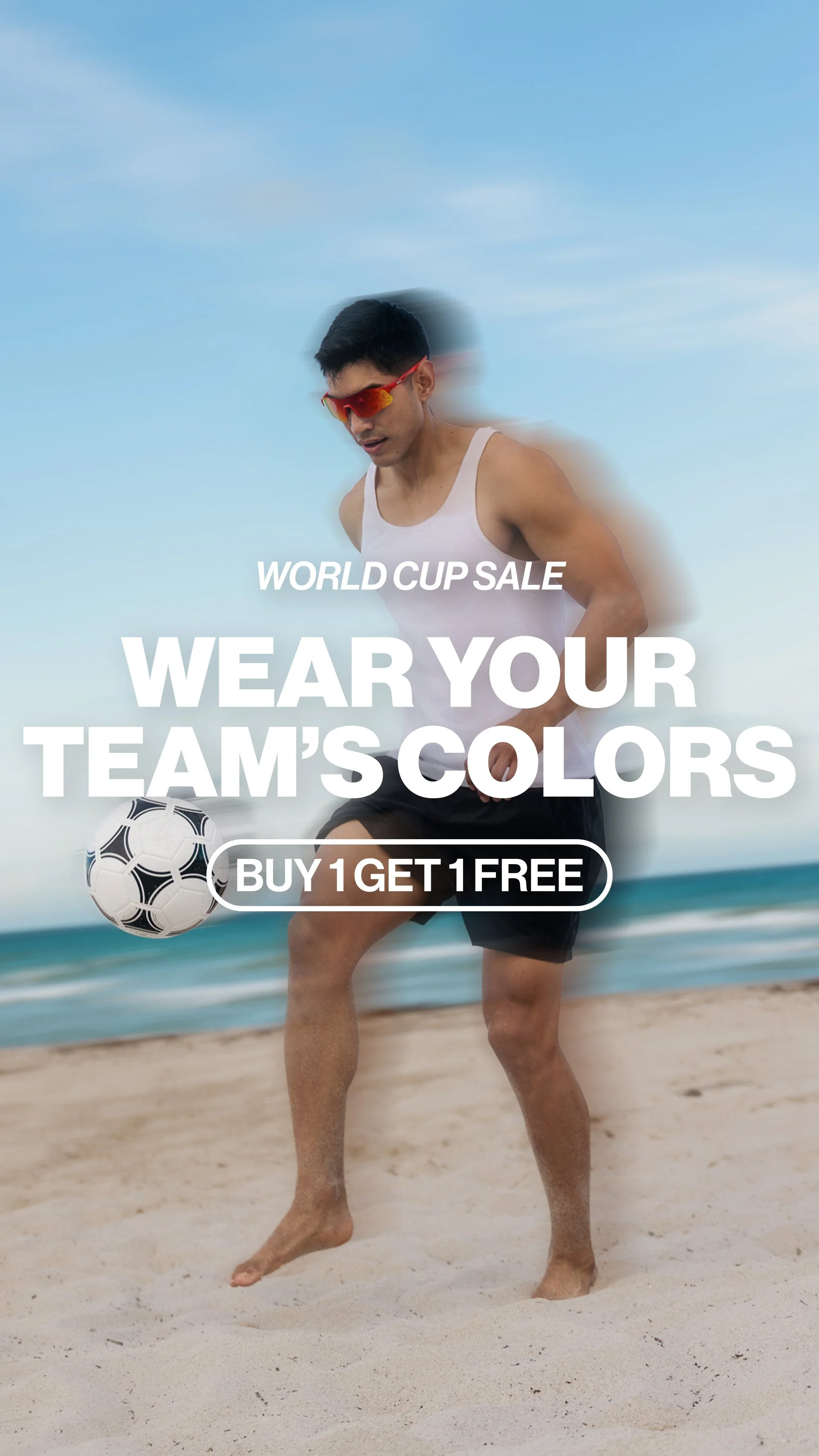 Man playing soccer on the beach, wearing sunglasses and a sleeveless shirt, with text promoting team colors for a World Cup sale and a buy one get one free offer.