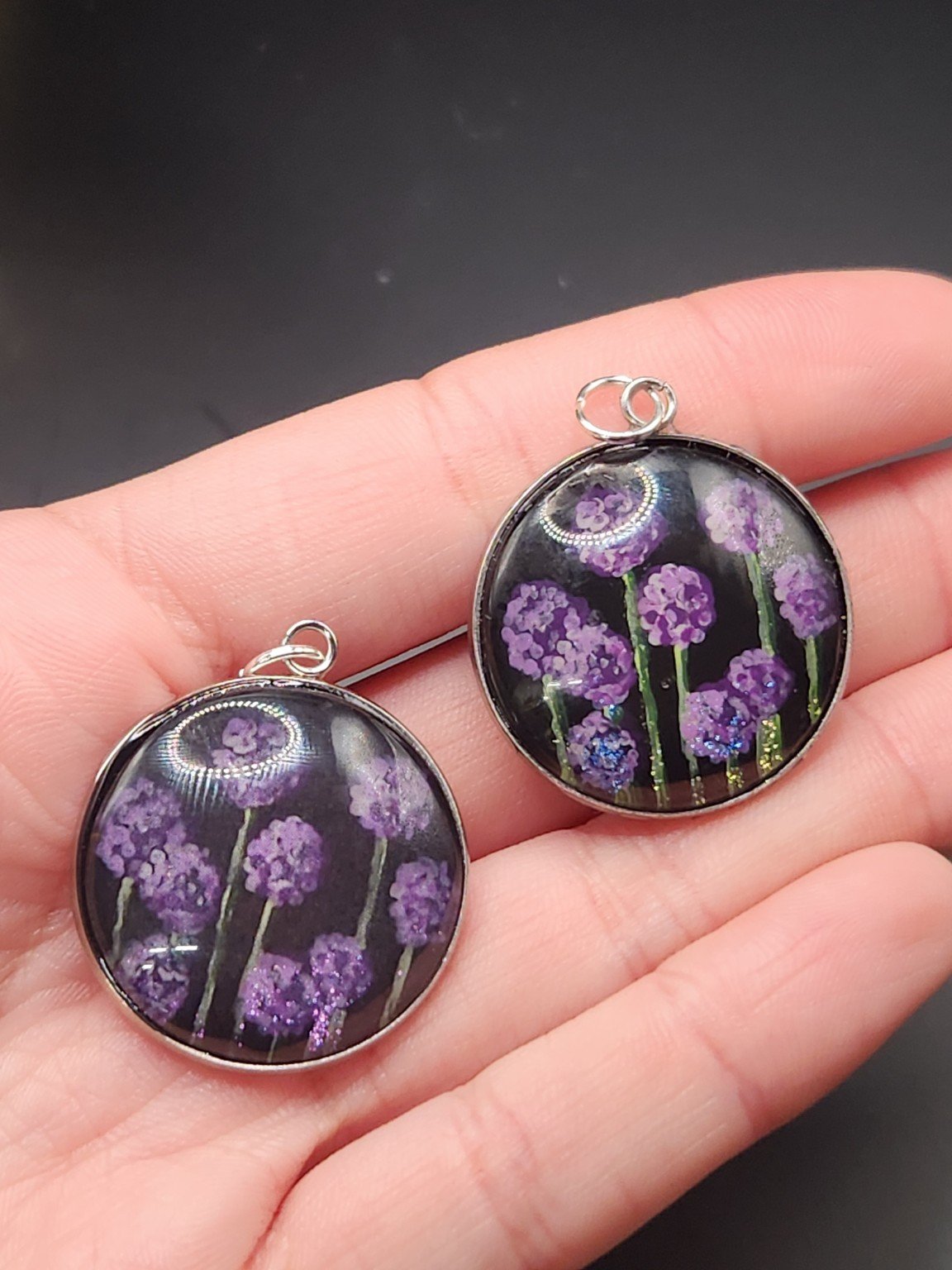 Allium pendant comparison: hand-painted original at the top right and printed reproduction at the bottom left.
