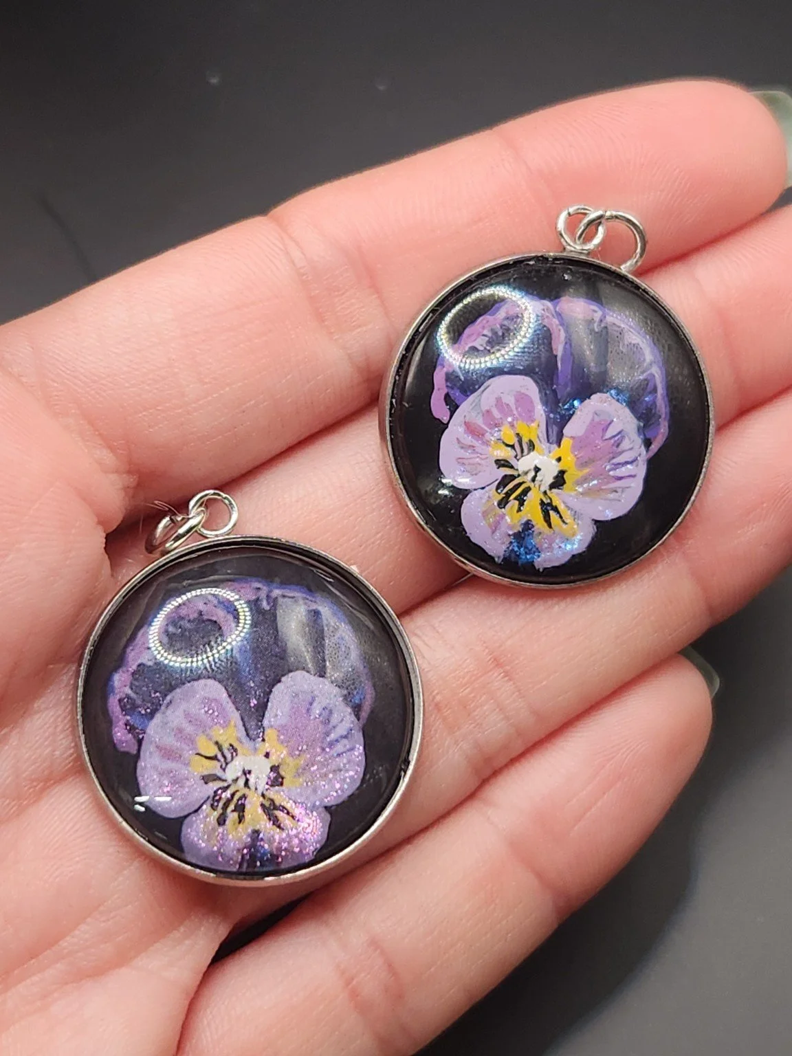 Viola pendant comparison: hand-painted original at the top right and printed reproduction at the bottom left.