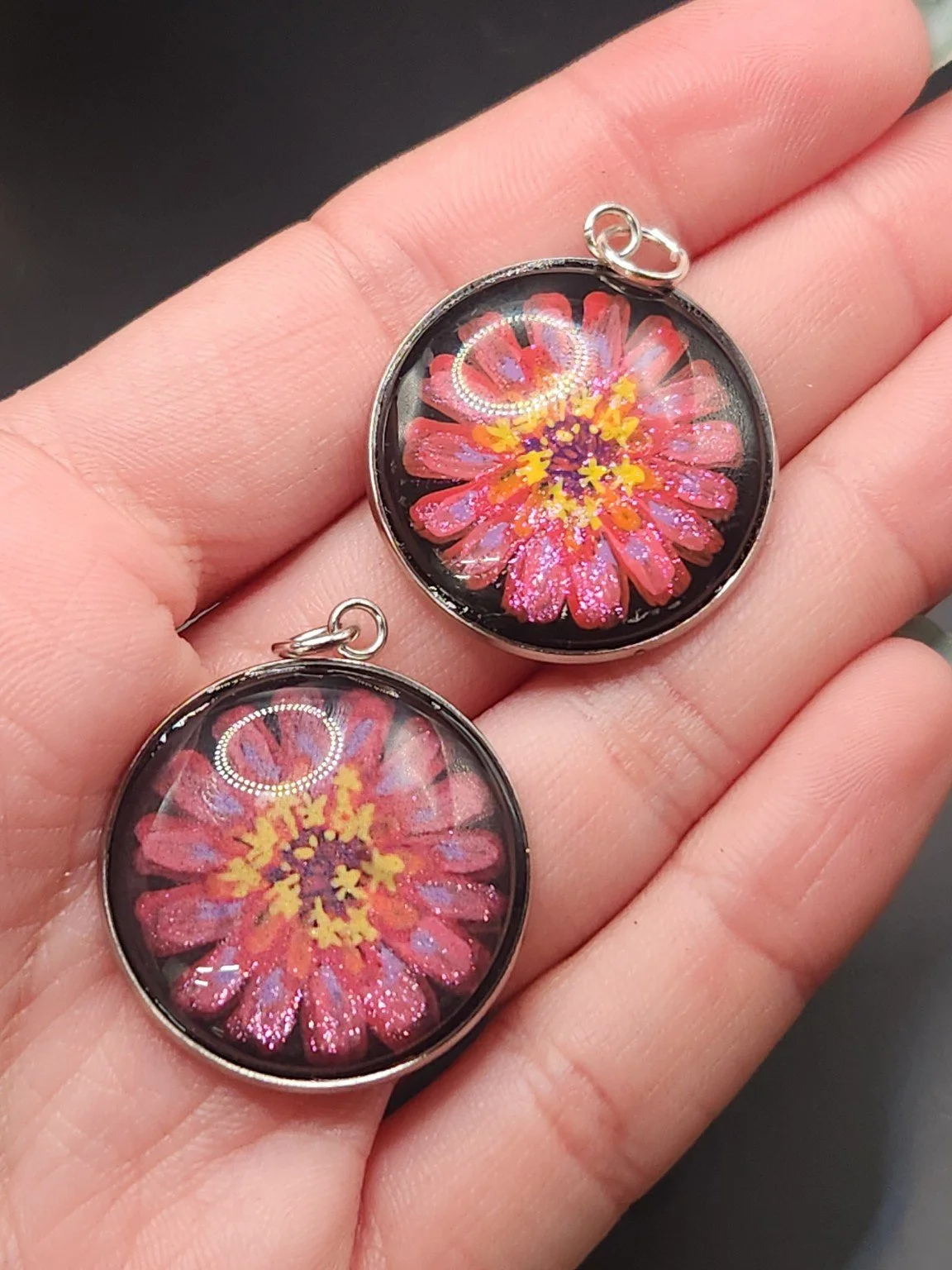 Zinnia pendant comparison: hand-painted original at the top right and printed reproduction at the bottom left.