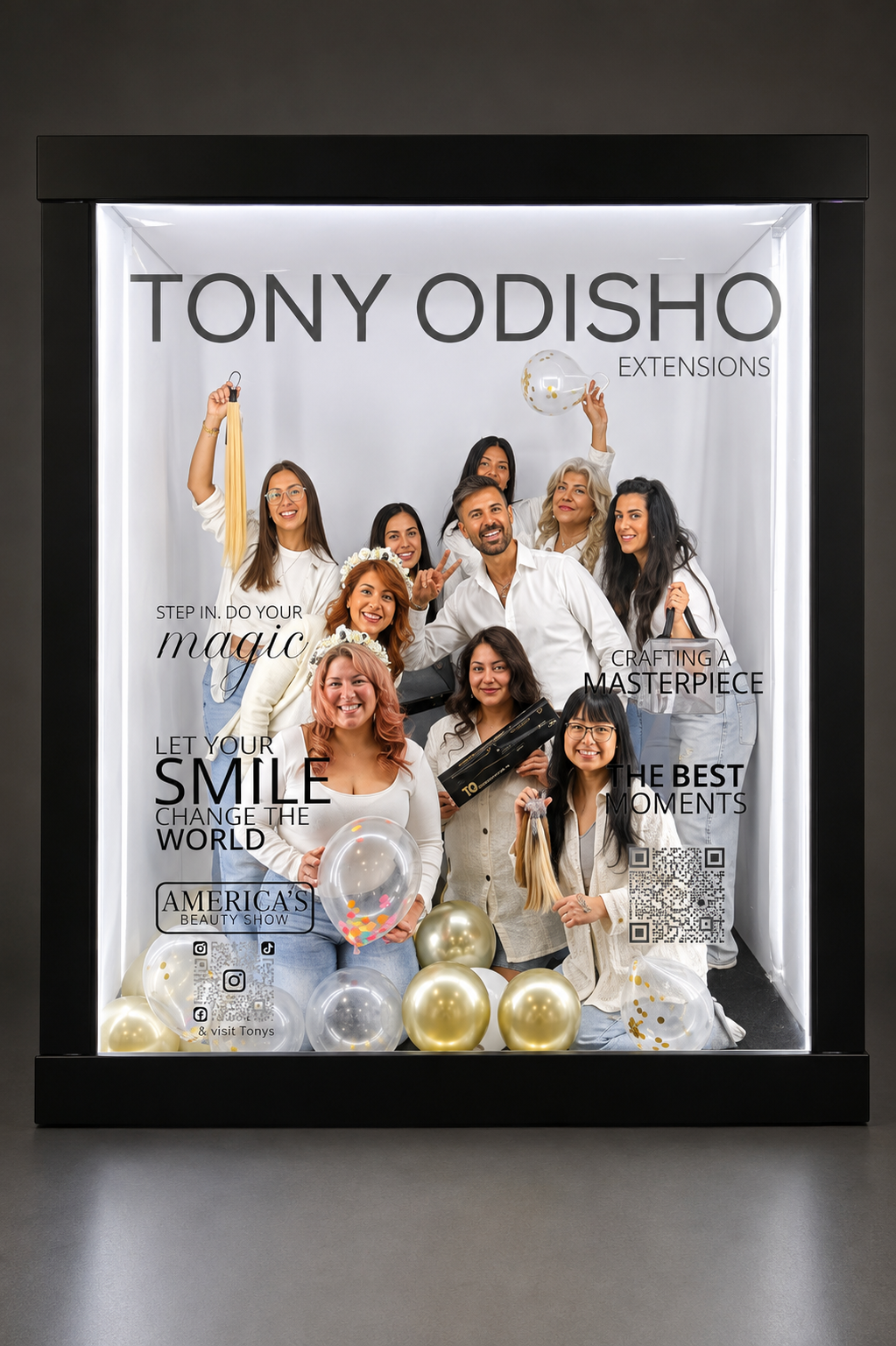 Chicago photobooth rental. 
Group of women and a man celebrating in a display case decorated with balloons and promotional text for Tony Odisho Extensions, promoting beauty and hair products.