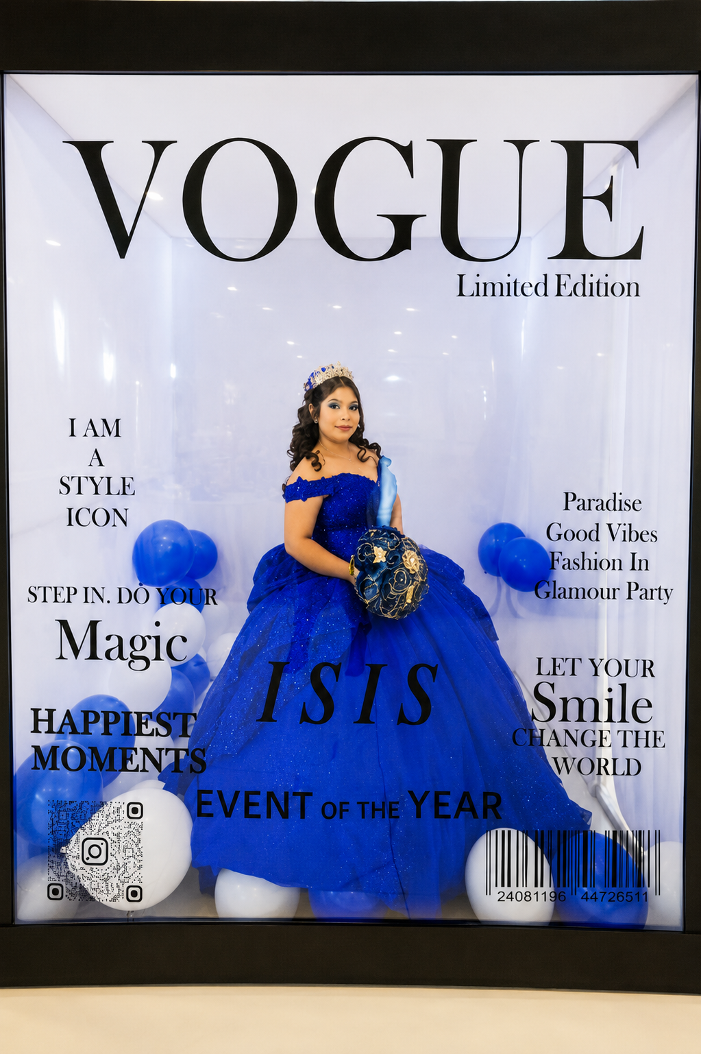 Young girl in a blue gown and tiara at a Vogue limited edition event, surrounded by balloons, with various positive phrases written around her. Chicago events decor photo booth rental