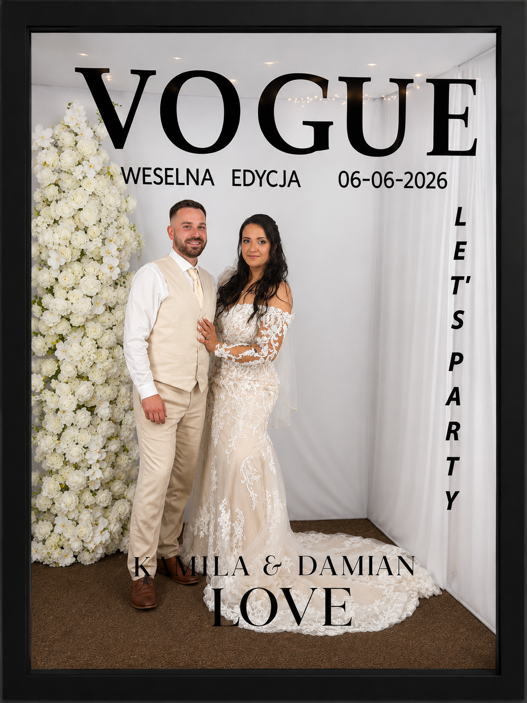 A newlywed couple standing in front of a floral backdrop and a large sign with the word "VOGUE" and wedding details, including names Kamila and Damian, date 06-06-2026, and the words "LET'S PARTY", with a white floral arrangement on the left. Chicago