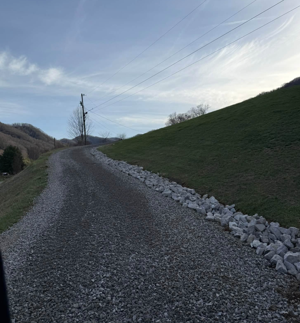 Professional land grading completed in Black Mountain, NC creating a level building site.