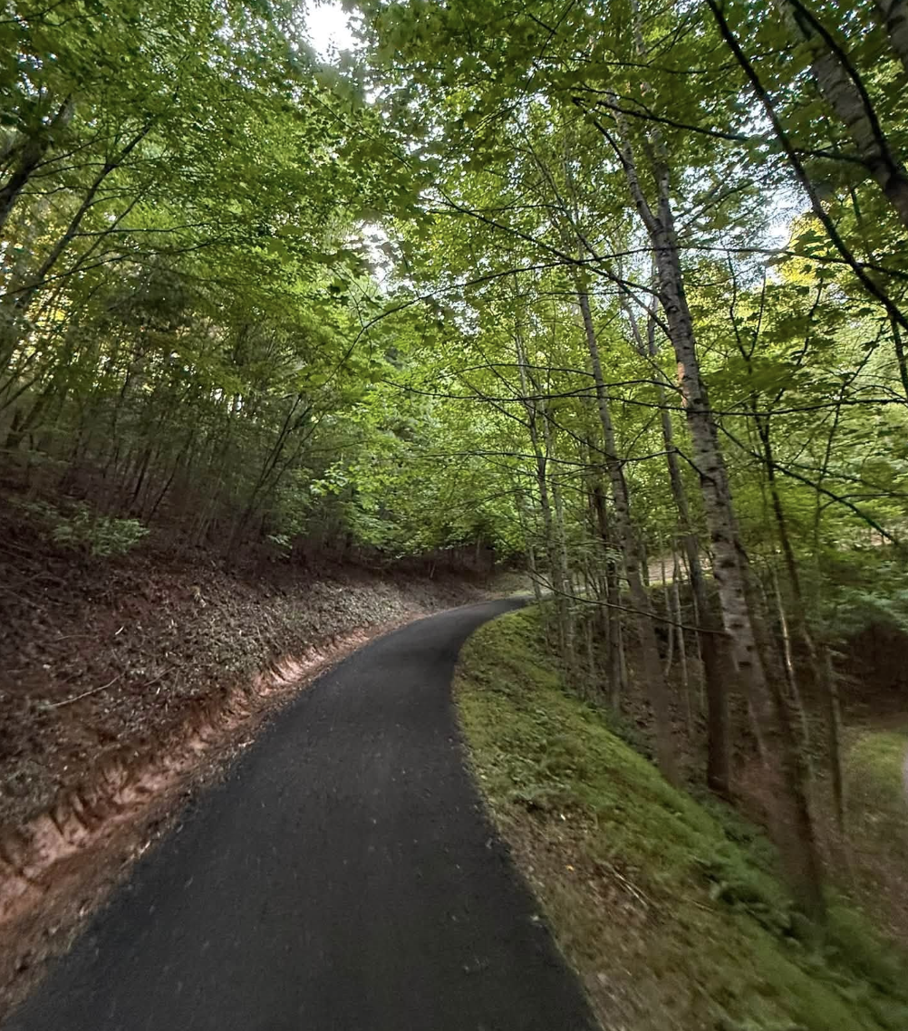 Finished gravel roadway following excavation, grading, ditch cleaning, and drainage improvements completed by M&S Land Management in Western North Carolina.
