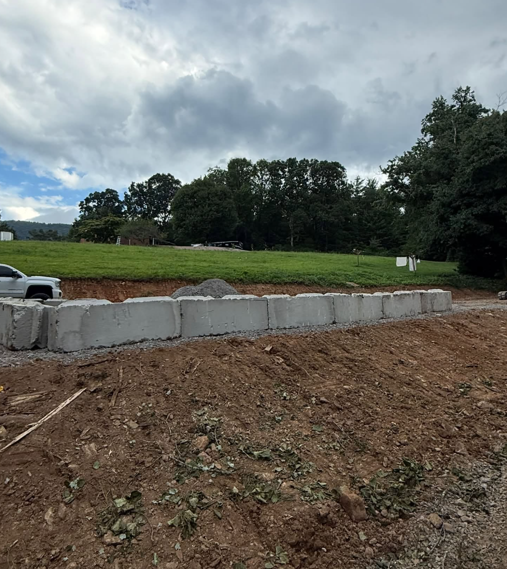 House pad construction completed in Fairview, NC creating a stable base for new construction.
