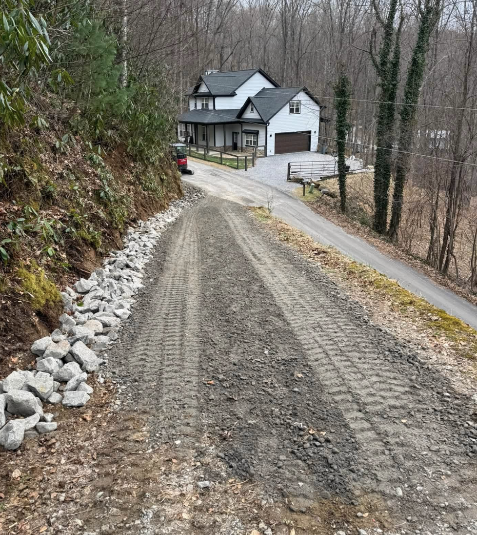 House pad excavation completed in Waynesville, NC with professional earthmoving.