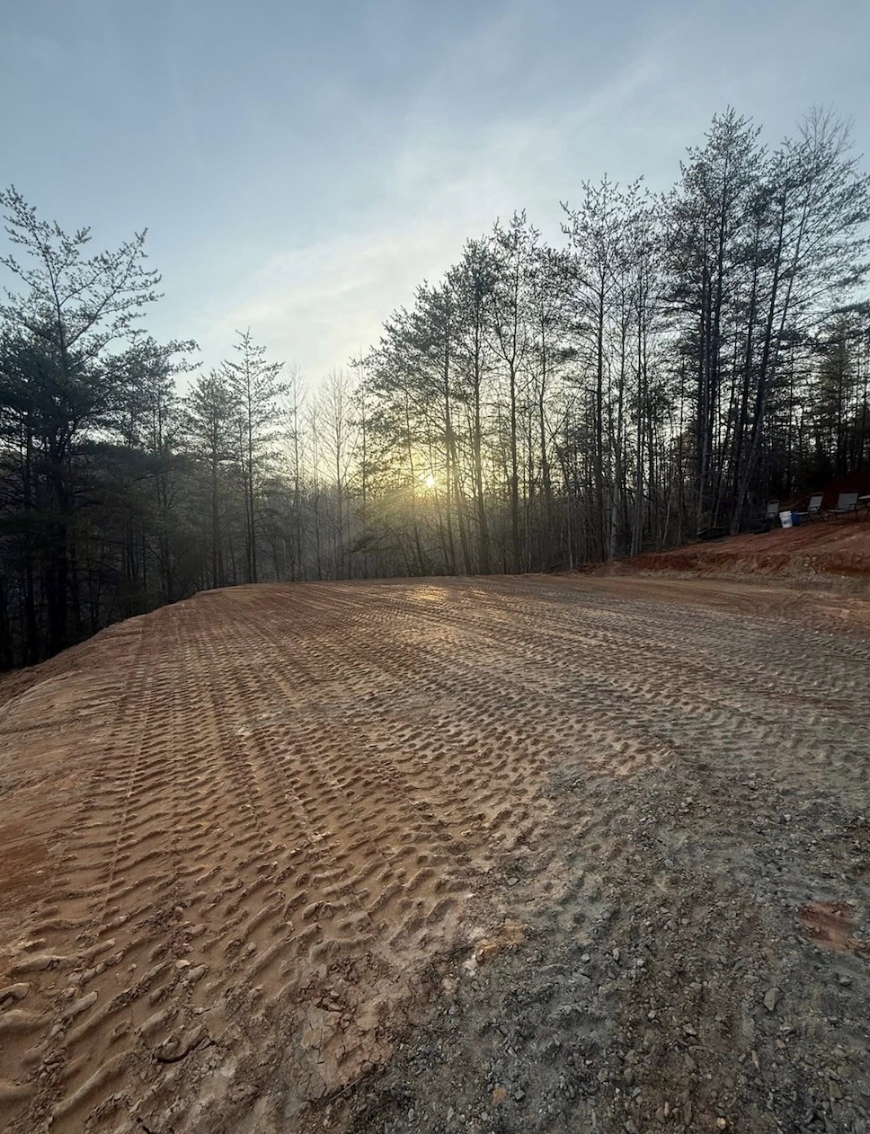 Drainage ditch installation to improve water runoff in Greer, South Carolina.