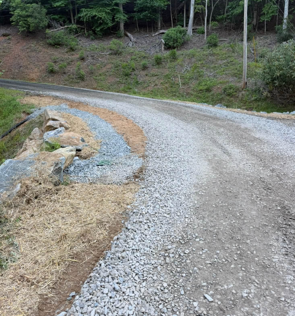 Complete land clearing, forestry mulching, grading, driveway installation, building site preparation, house pad construction, drainage solutions, and excavation project completed by M&S Land Management, proudly serving Western North Carolina and the 