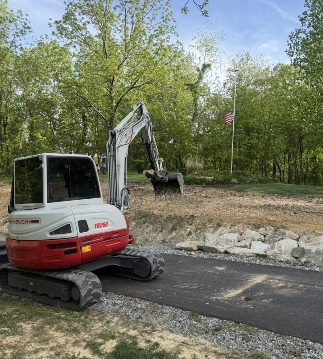 Gravel driveway installation for a residential property in Simpsonville, South Carolina.