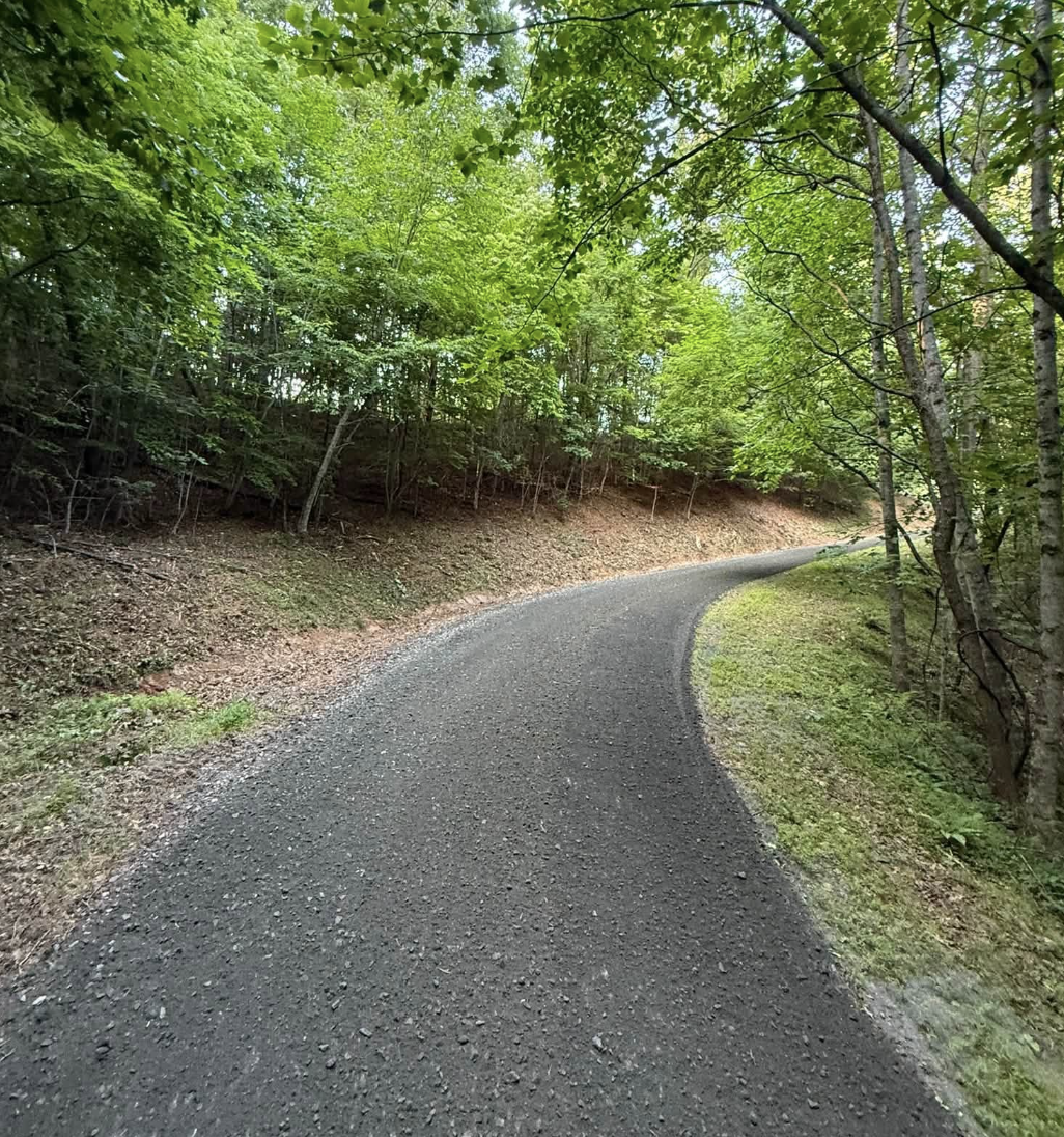 Gravel driveway installation completed in Canton, NC using professional grading techniques.