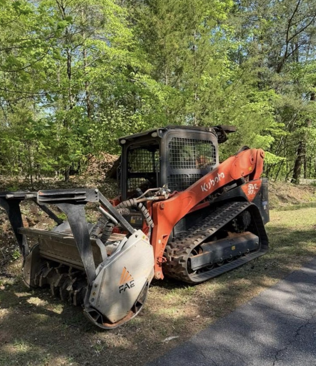 Residential gravel driveway installation in Spartanburg, South Carolina.