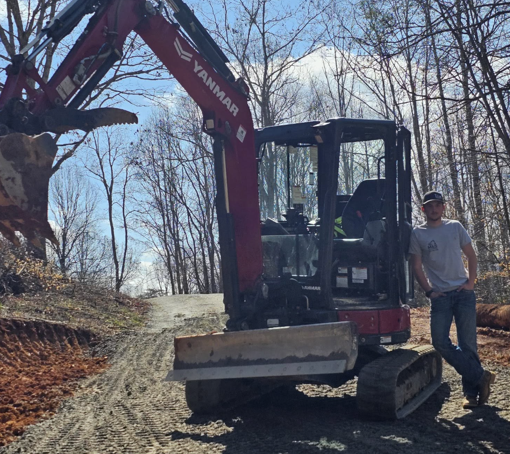Professional land clearing, forestry mulching, excavation, grading, driveway installation, and site preparation in Greenville, SC