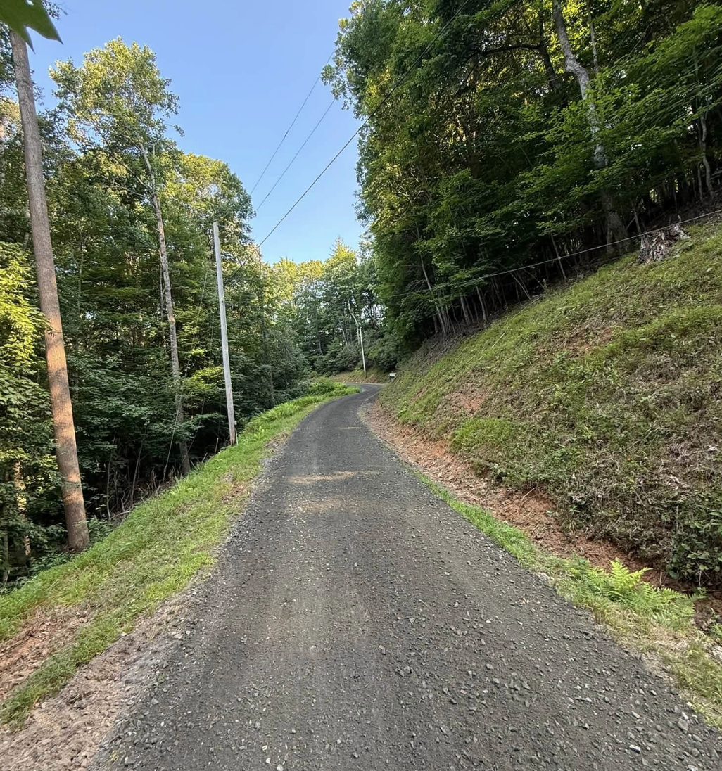 Site preparation project completed in Candler, NC with precision grading and excavation.