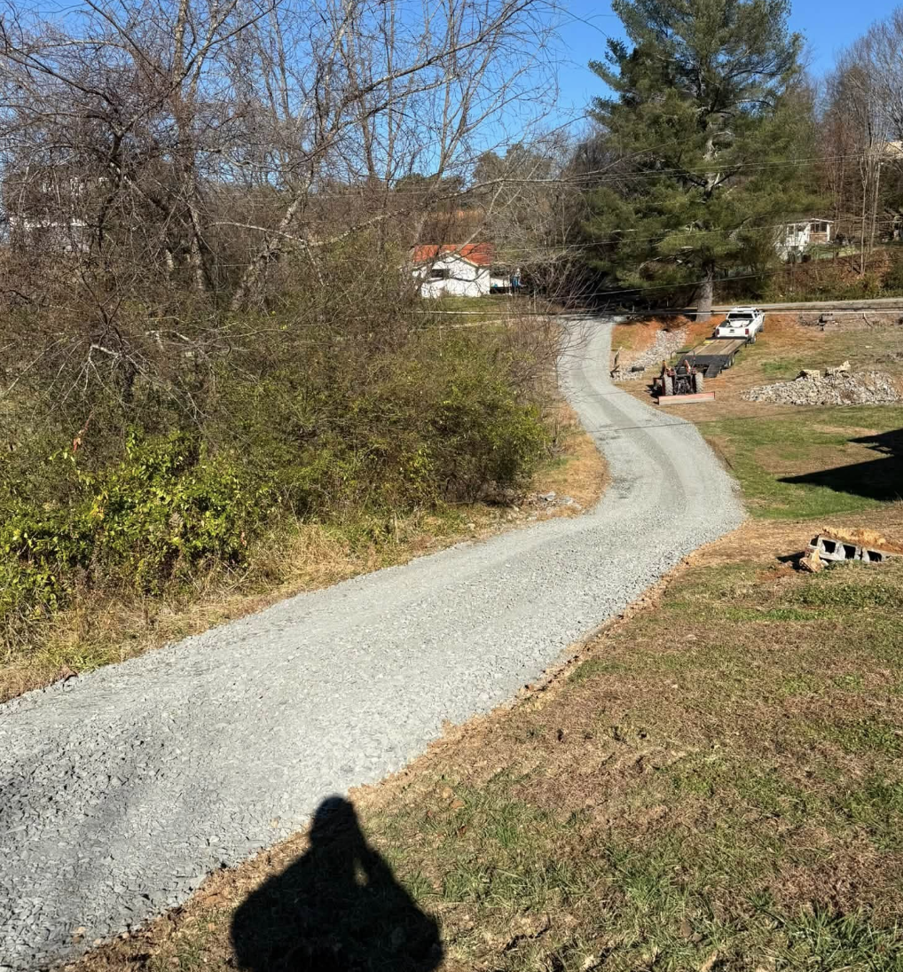 Gravel driveway installation completed in Fairview, NC for reliable year-round access.