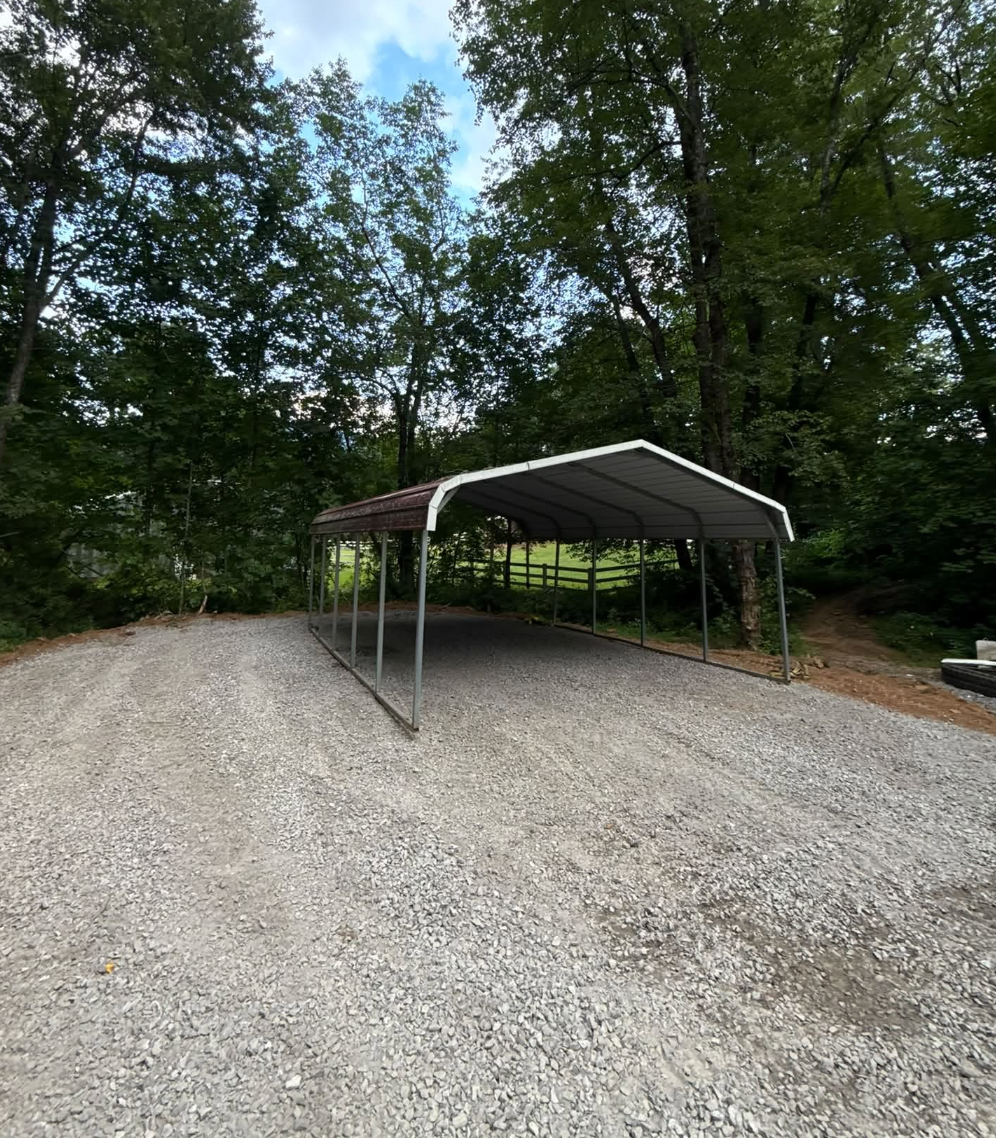 Forestry mulching services completed in Fletcher, NC reclaiming overgrown land.