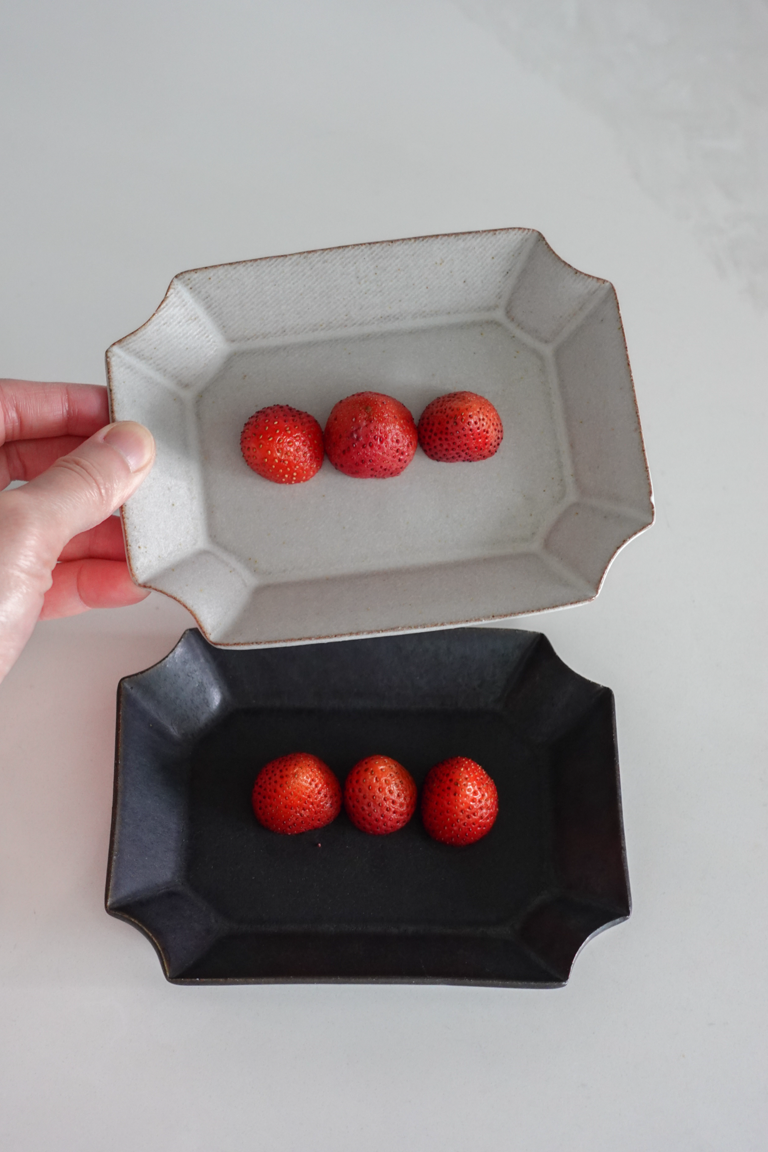 Raw On Palms Ceramics – Kage Ori Platter Emerald Matte White and Charcoal Black Stoneware with Fruits.png