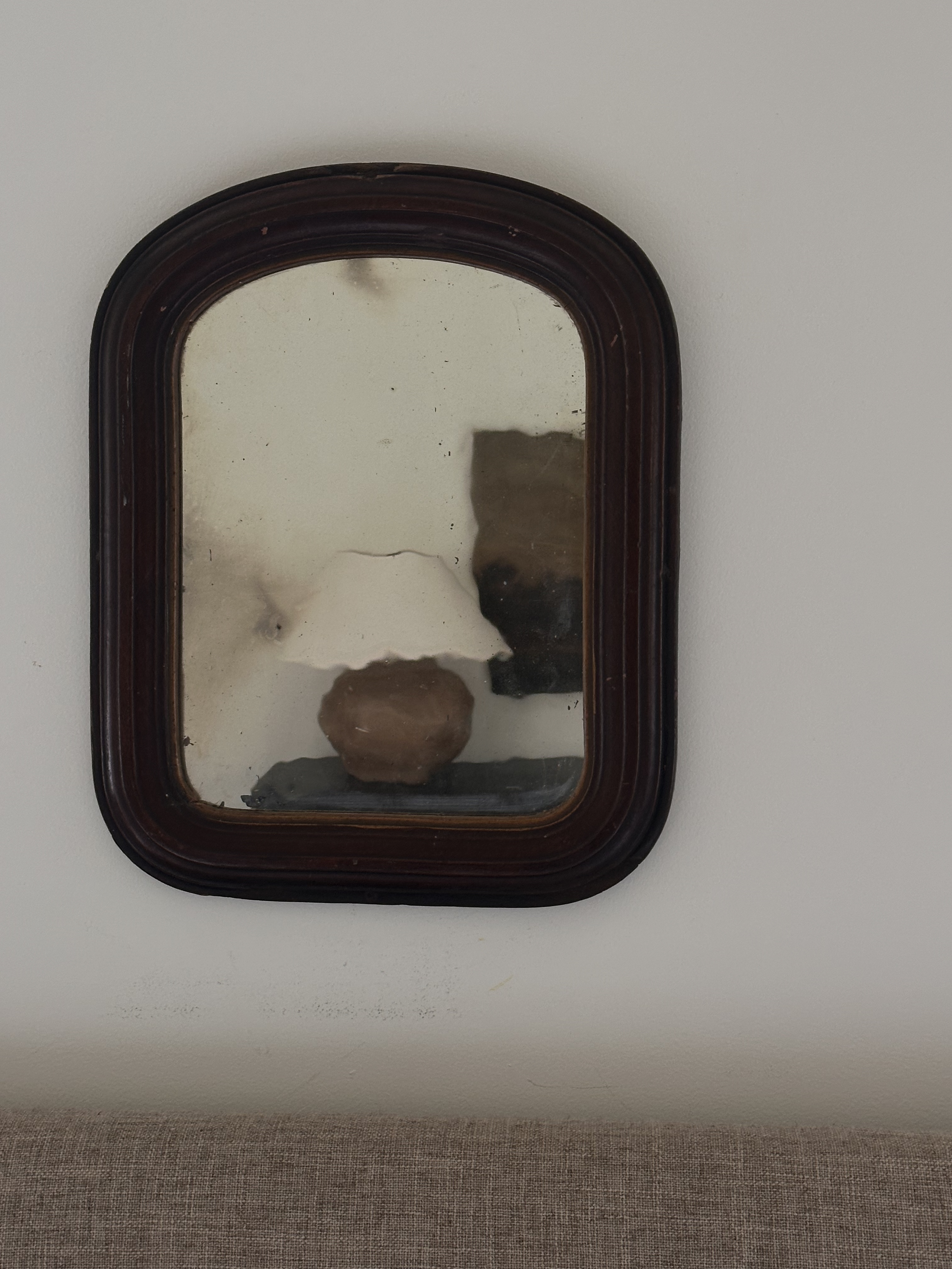 Antique arched primitive mirror