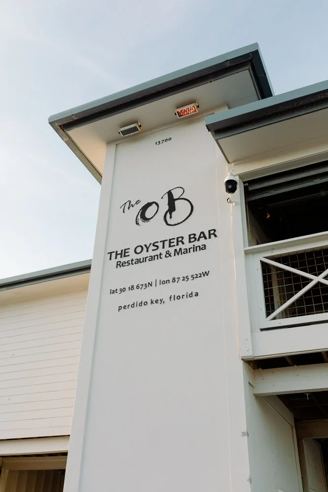 Sign for The Oyster Bar restaurant and marina located at Perdido Key, Florida.
