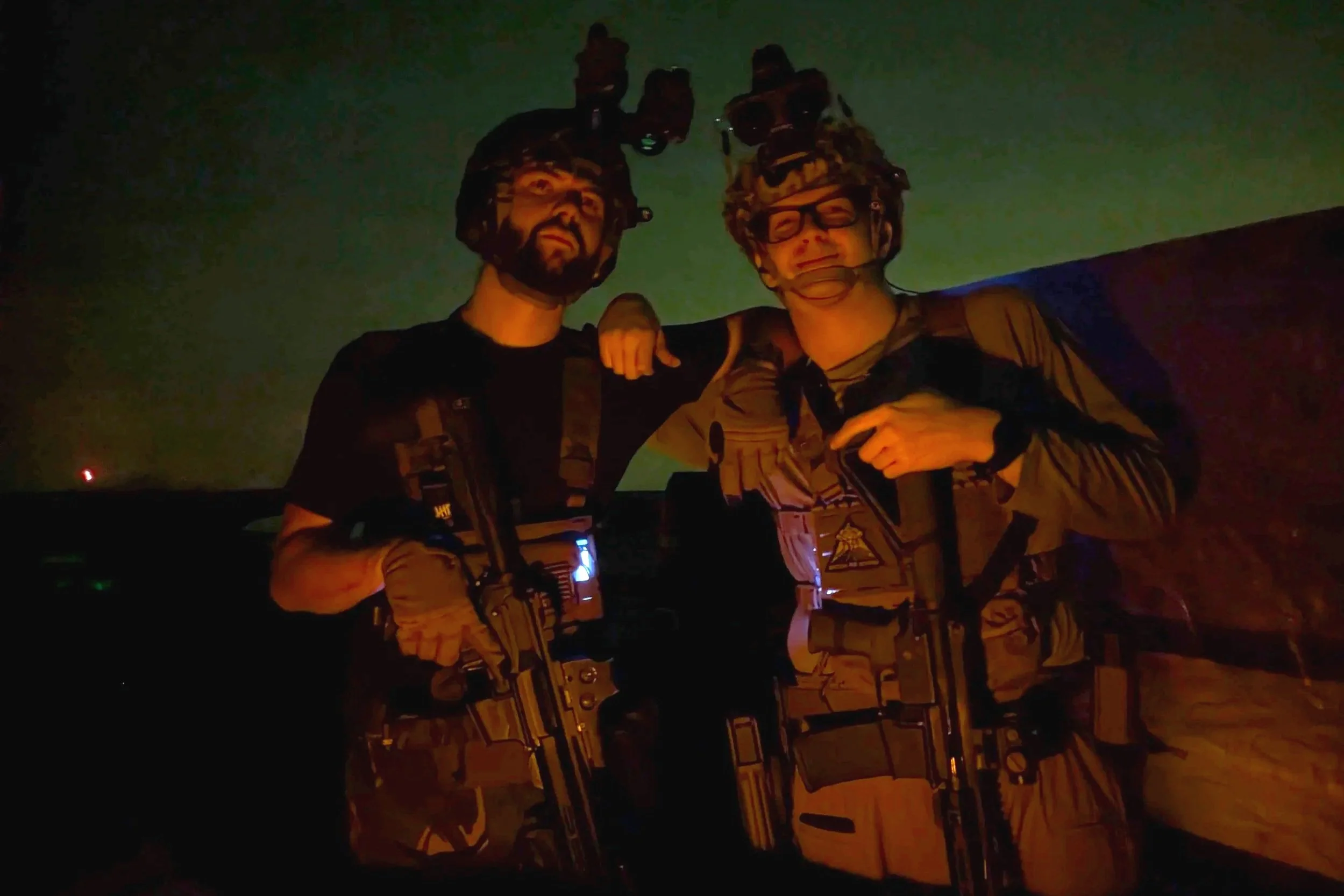Two Tempest members posing together at a local night shooting event.