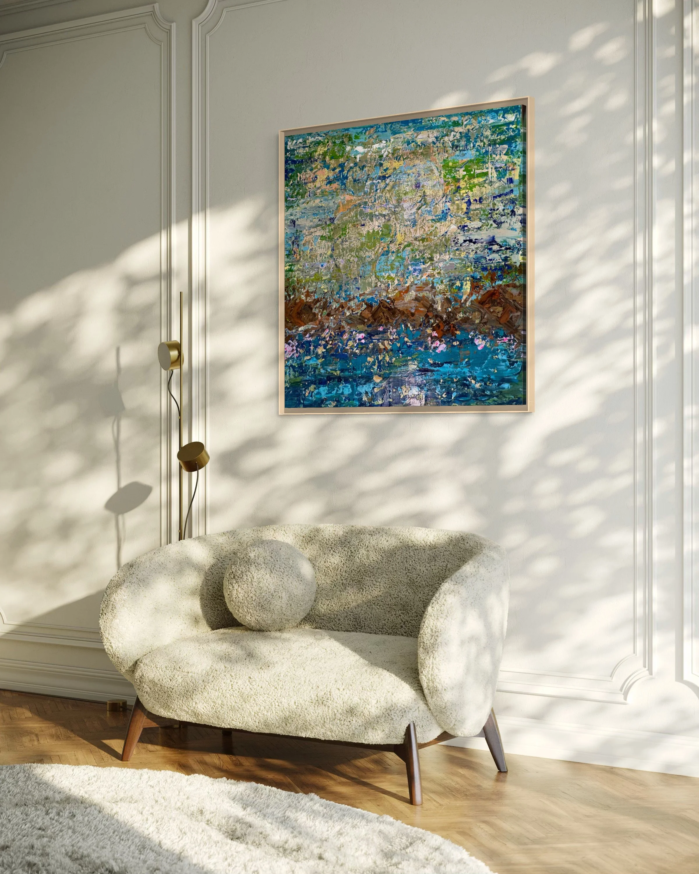 The Pond Dreams in Blue by Roya Rad displayed in a bright, elegant living room, framed above a cream bouclé sofa with a brass floor lamp. Digital mockup for scale reference.