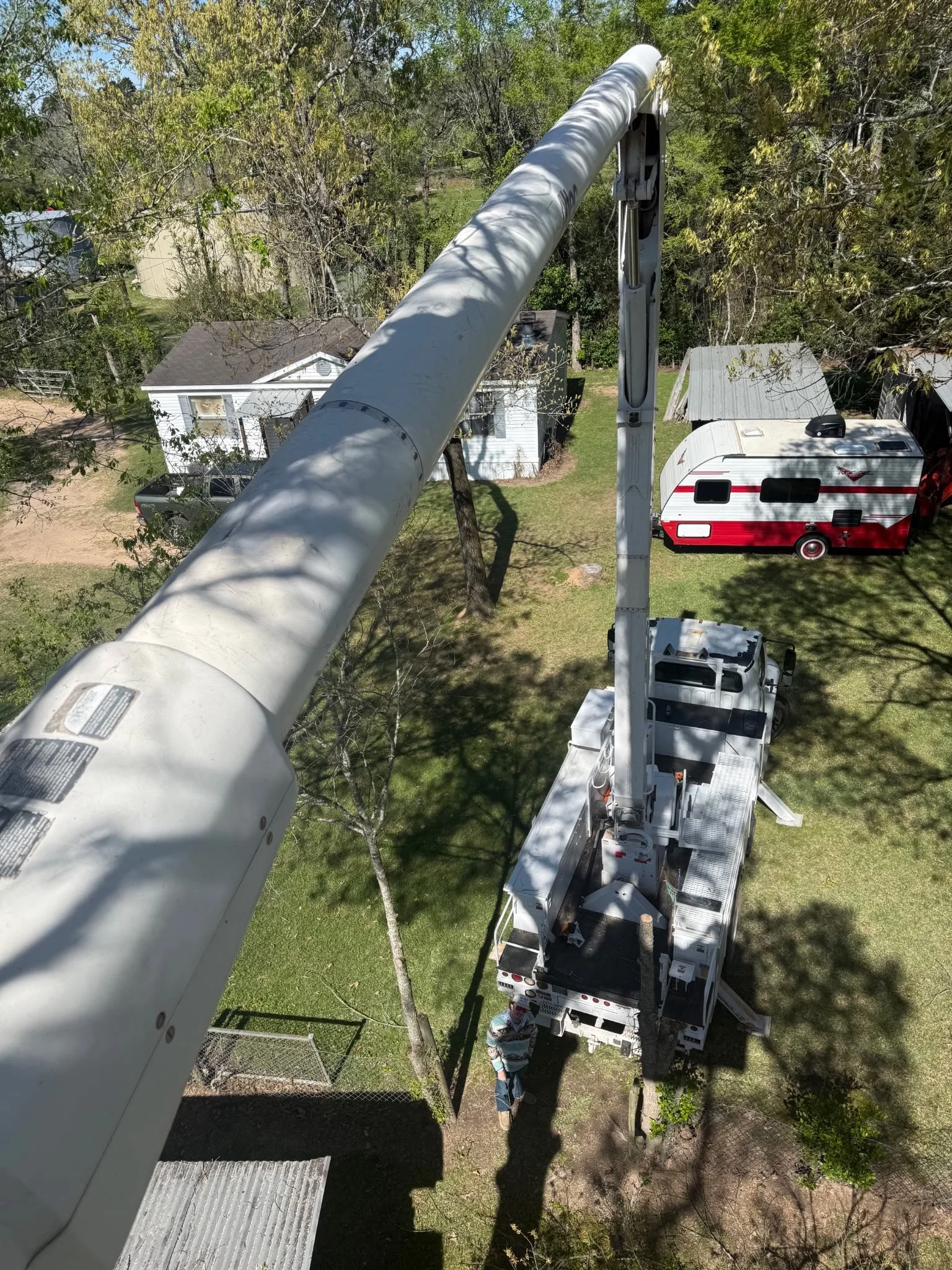 Aerial view while we are working on a tree with a bucket truck.