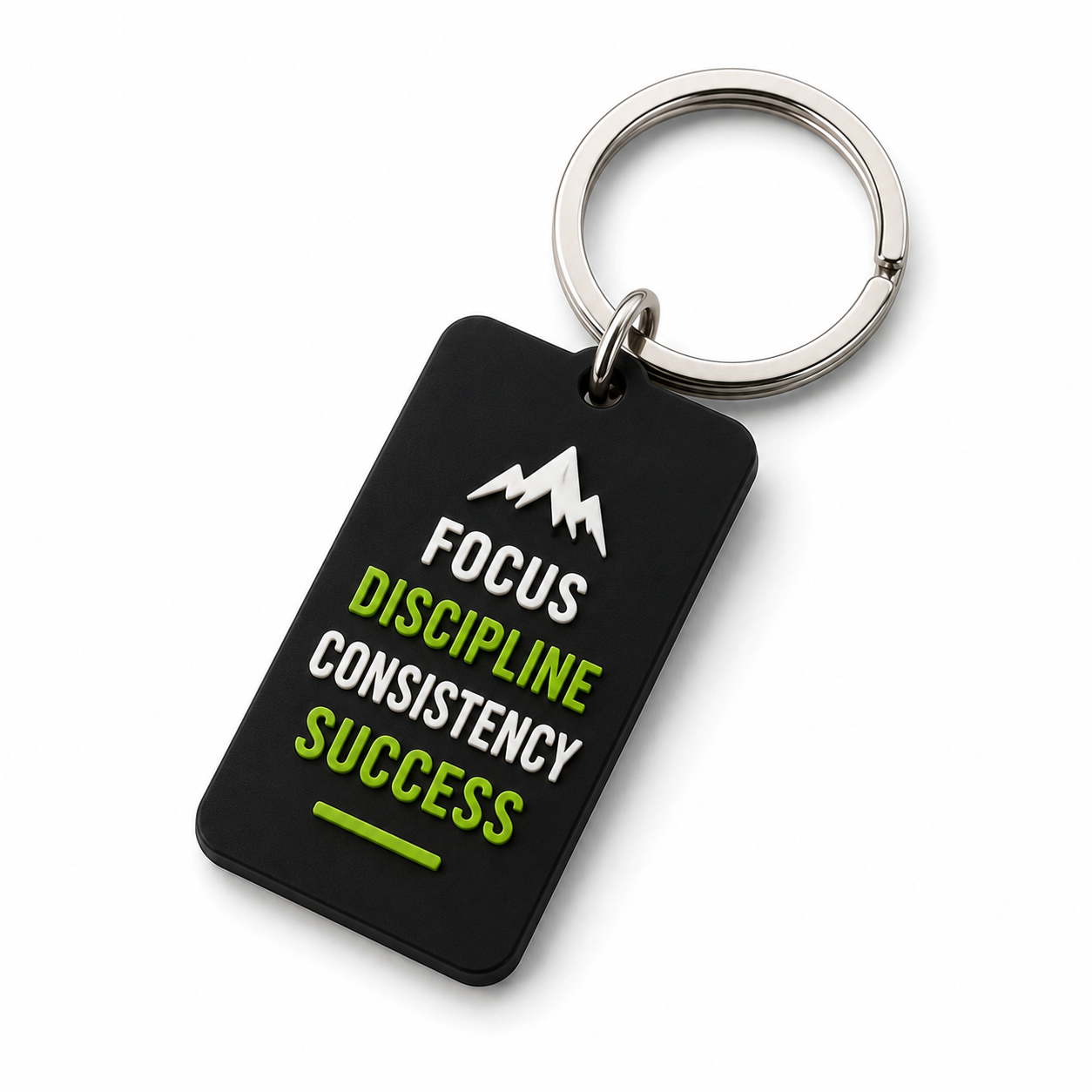 Black keychain with motivational words and symbols, includes words 'Focus', 'Discipline', 'Consistency', 'Success' in white and green, and a white mountain symbol with an upward arrow.