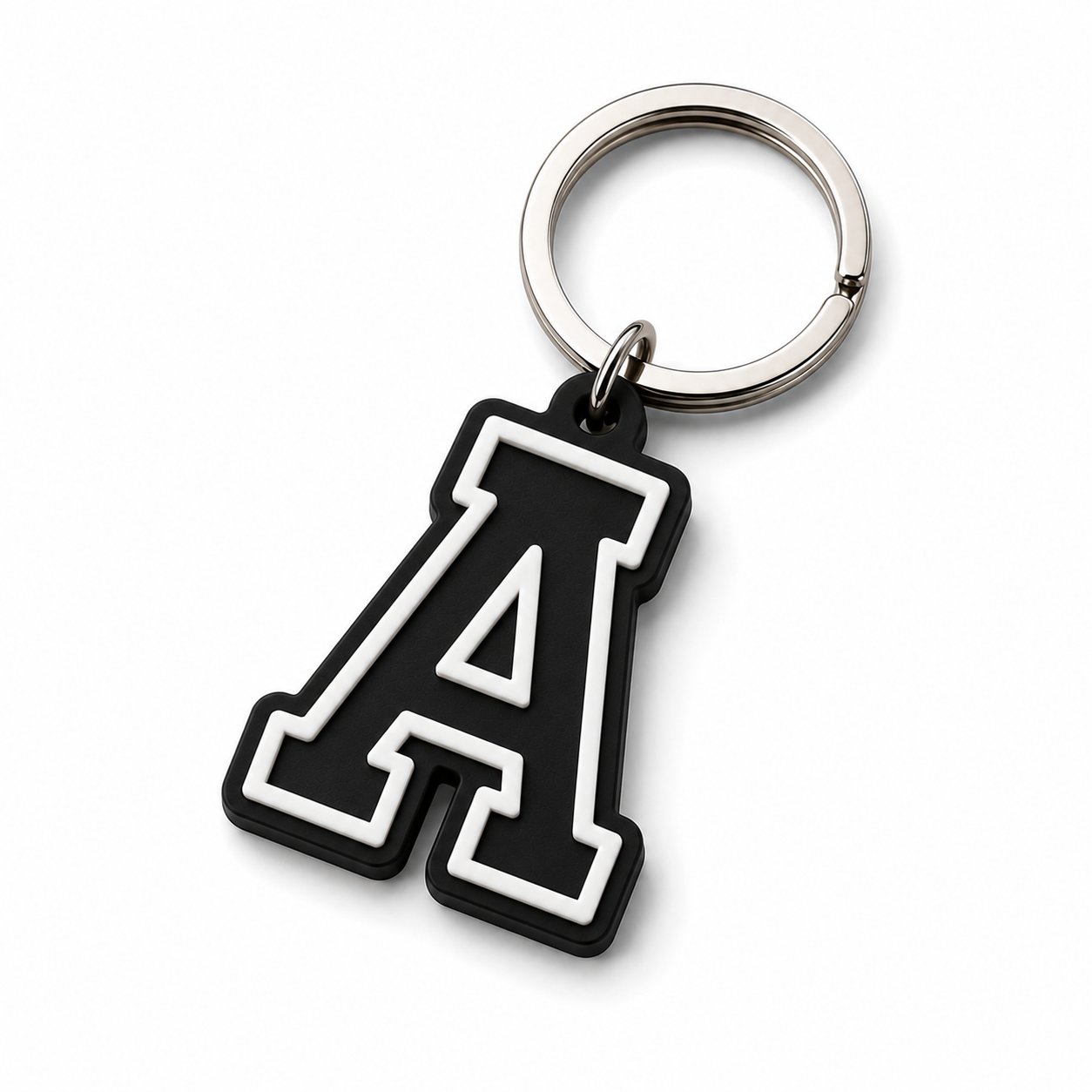 Black and white letter 'A' keychain attached to a silver keyring on a white background.