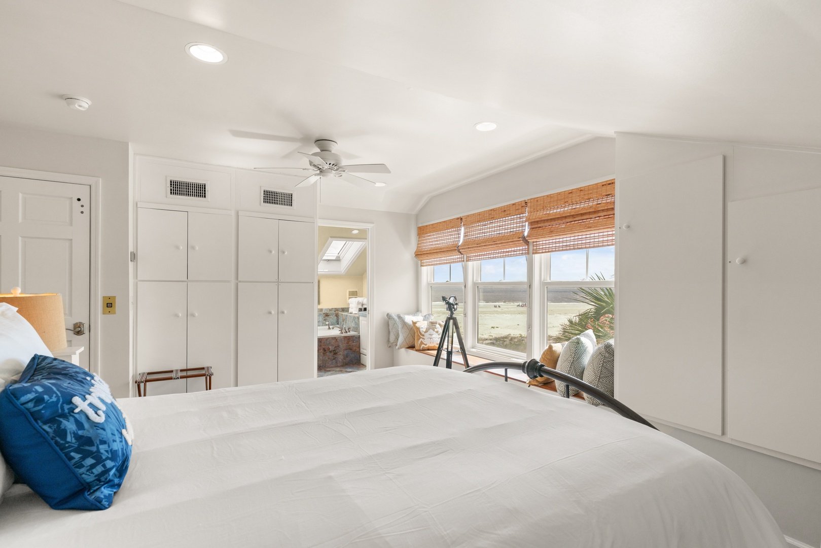 Third floor bedroom with sweeping beach views, independent HVAC and queen bed.