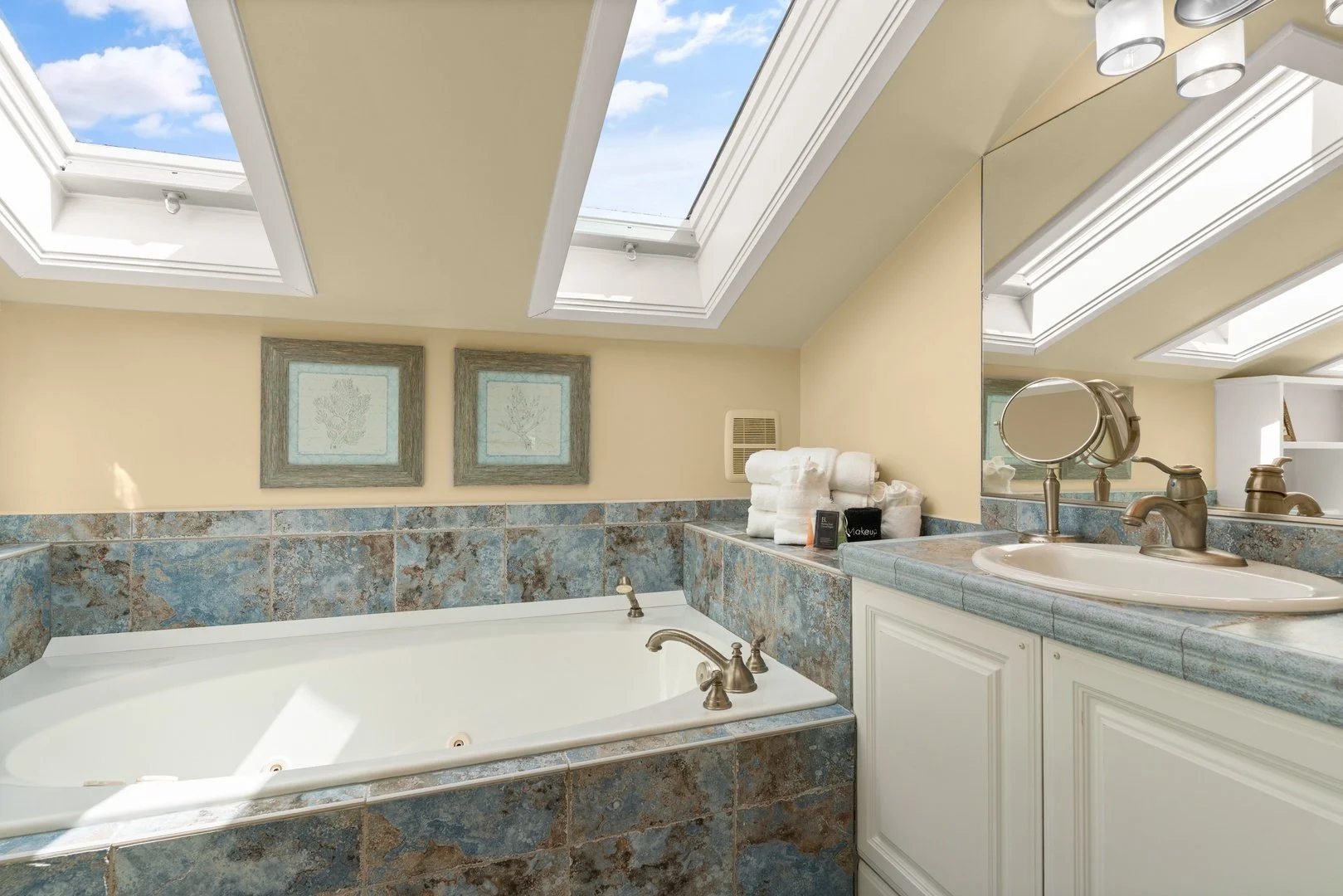 3rd floor bath with jetted tub and skylights