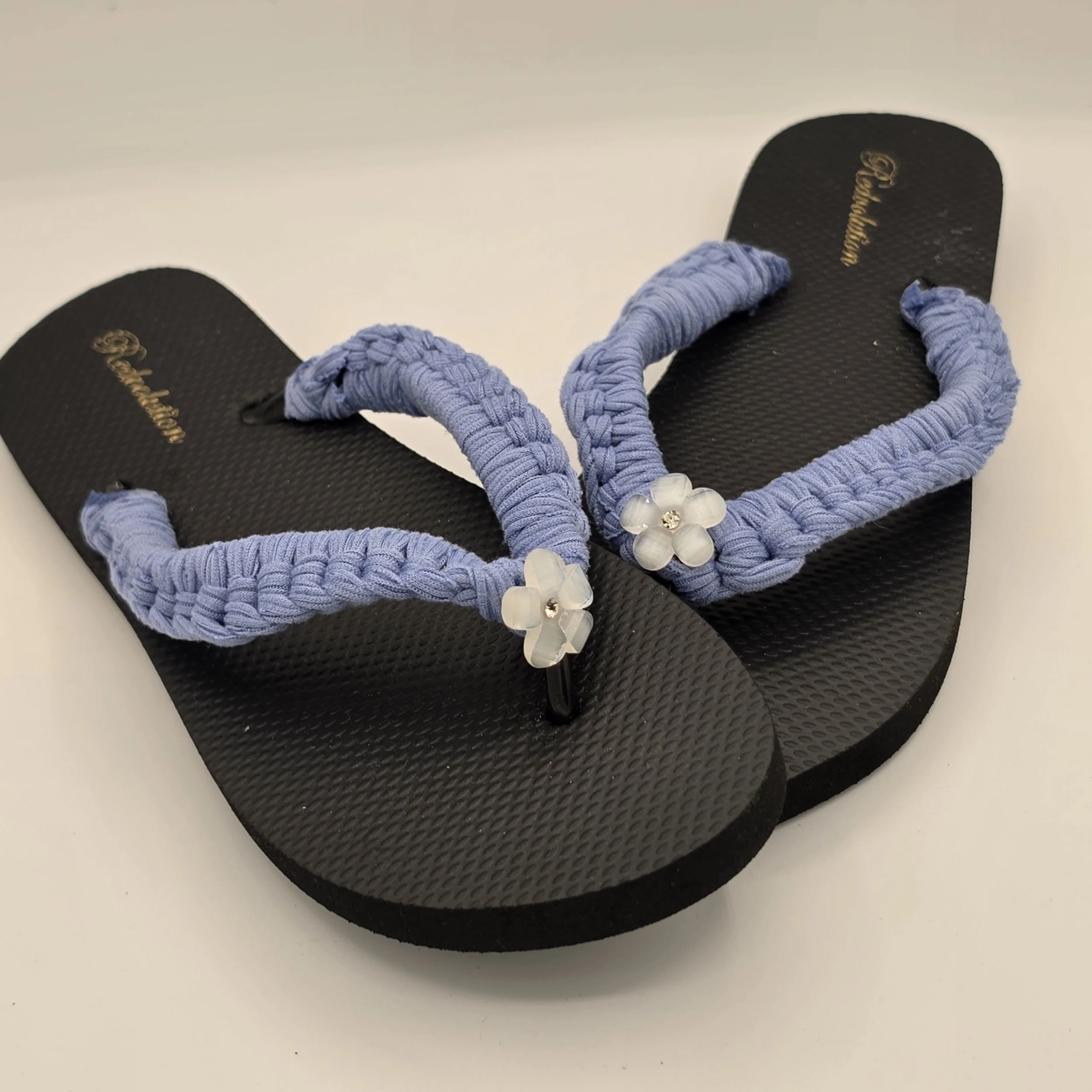 Blue puff with white rhinestone flower