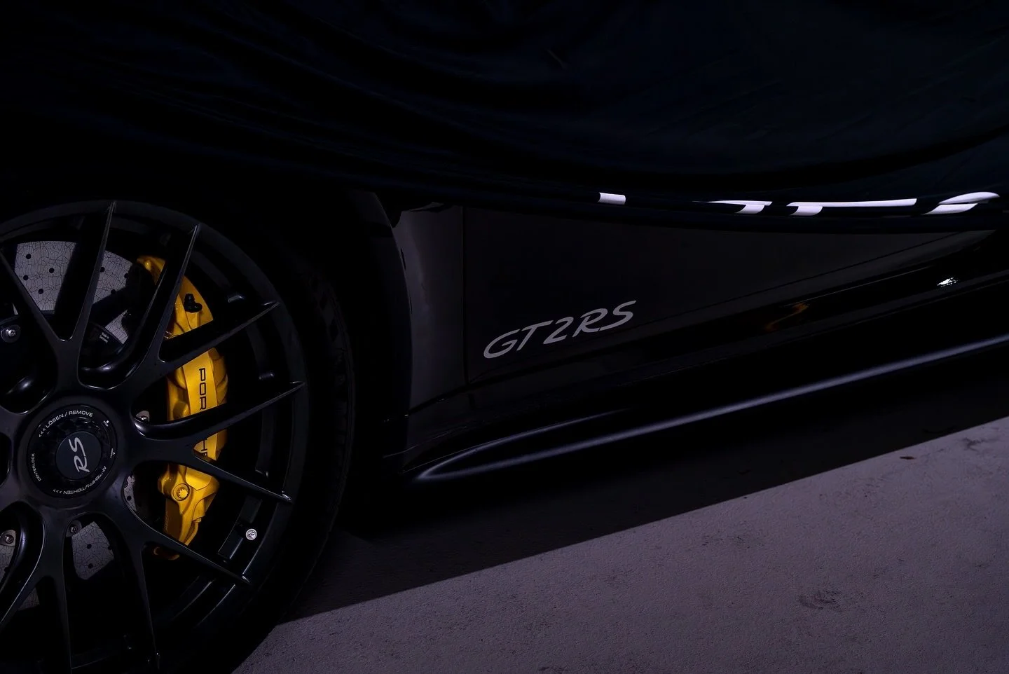 &ldquo;Sleeping Beast! 🖤💛

Under the cover lies pure performance and adrenaline. The GT2RS is ready to unleash its power on the track. Who else loves this kind of anticipation? #GT2RS #Porsche 

____________________________________________
#Superca