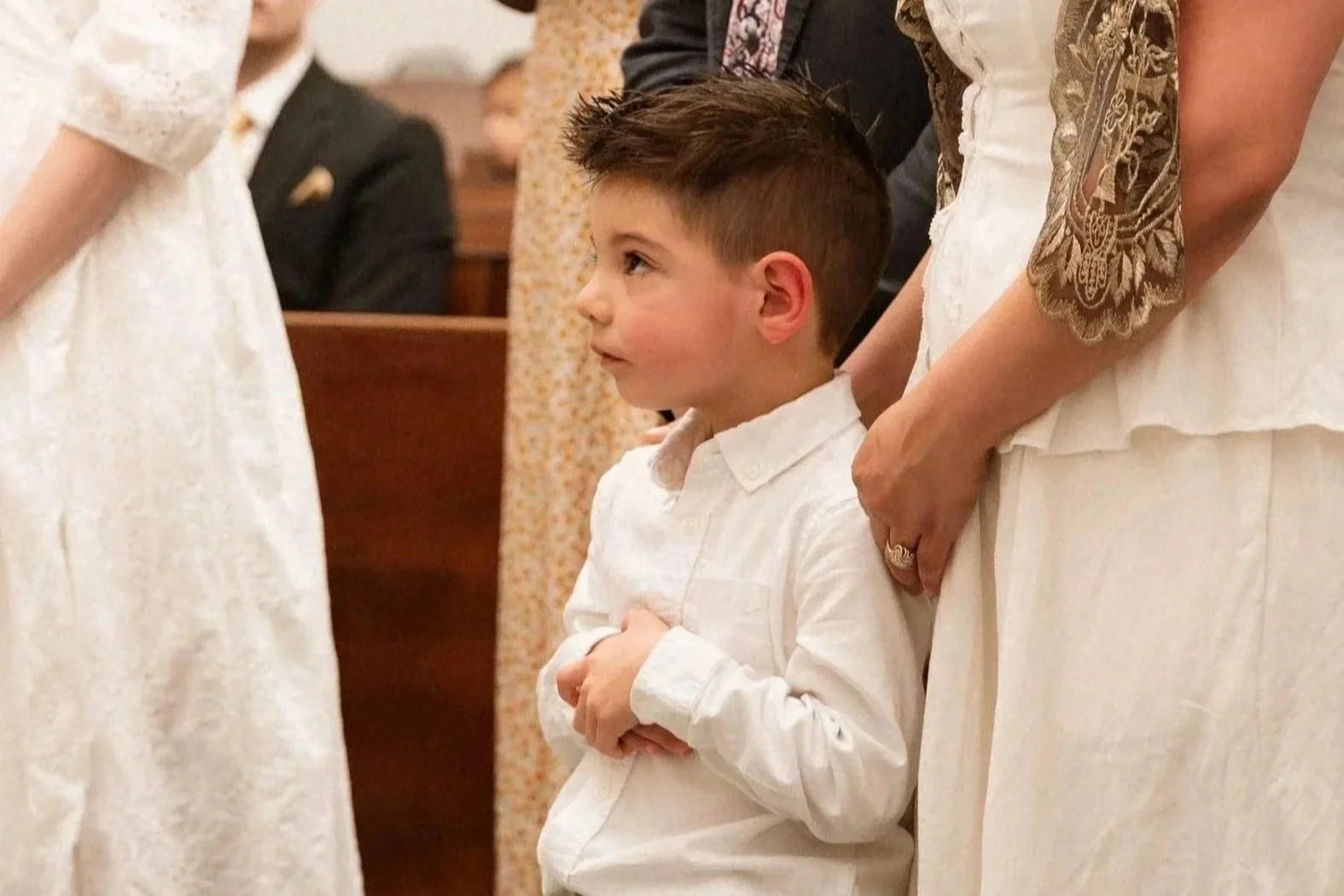 Children being baptized in Latah Catholic