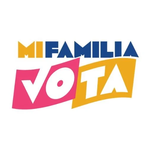Text graphic with colorful letters reading 'Mi Familia Vota' in bold, stylized font.