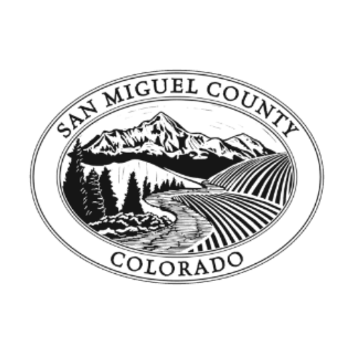 Seal of San Miguel County, Colorado, featuring mountains, a river, trees, and farmland in black and white.