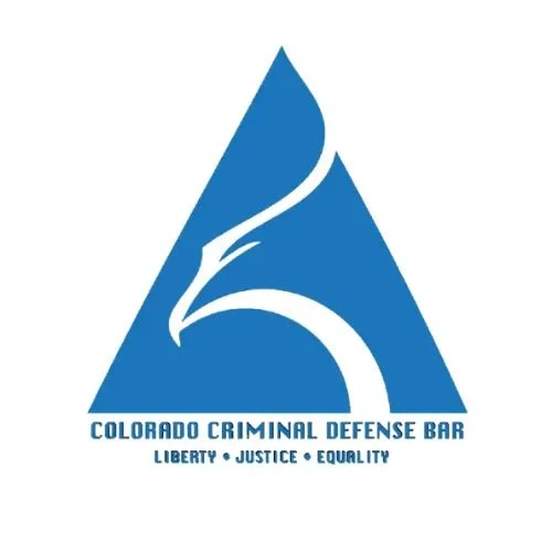 Logo of the Colorado Criminal Defense Bar featuring an eagle head inside a blue triangle with the words 'Liberty, Justice, Equality' underneath.