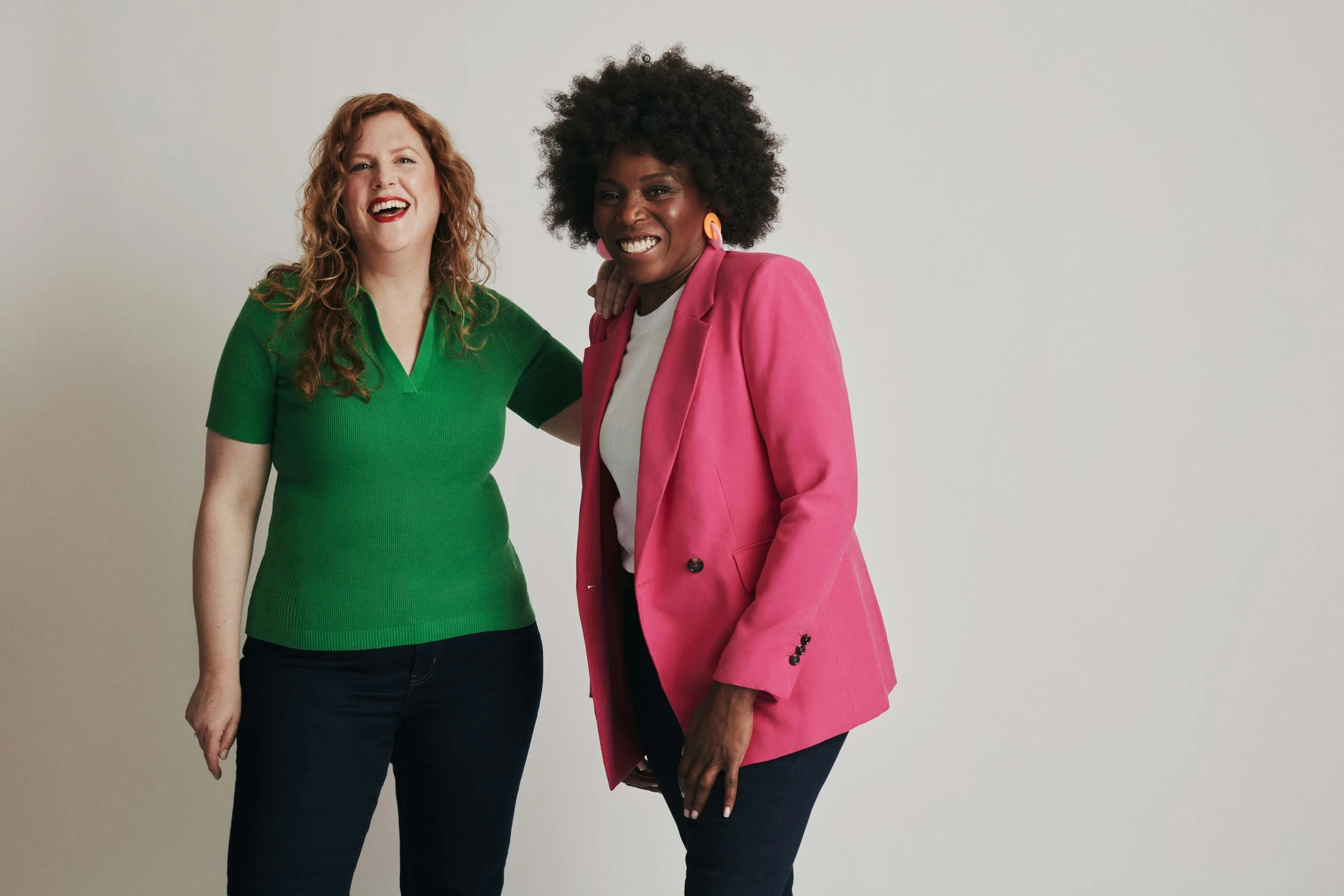 two women smiling together