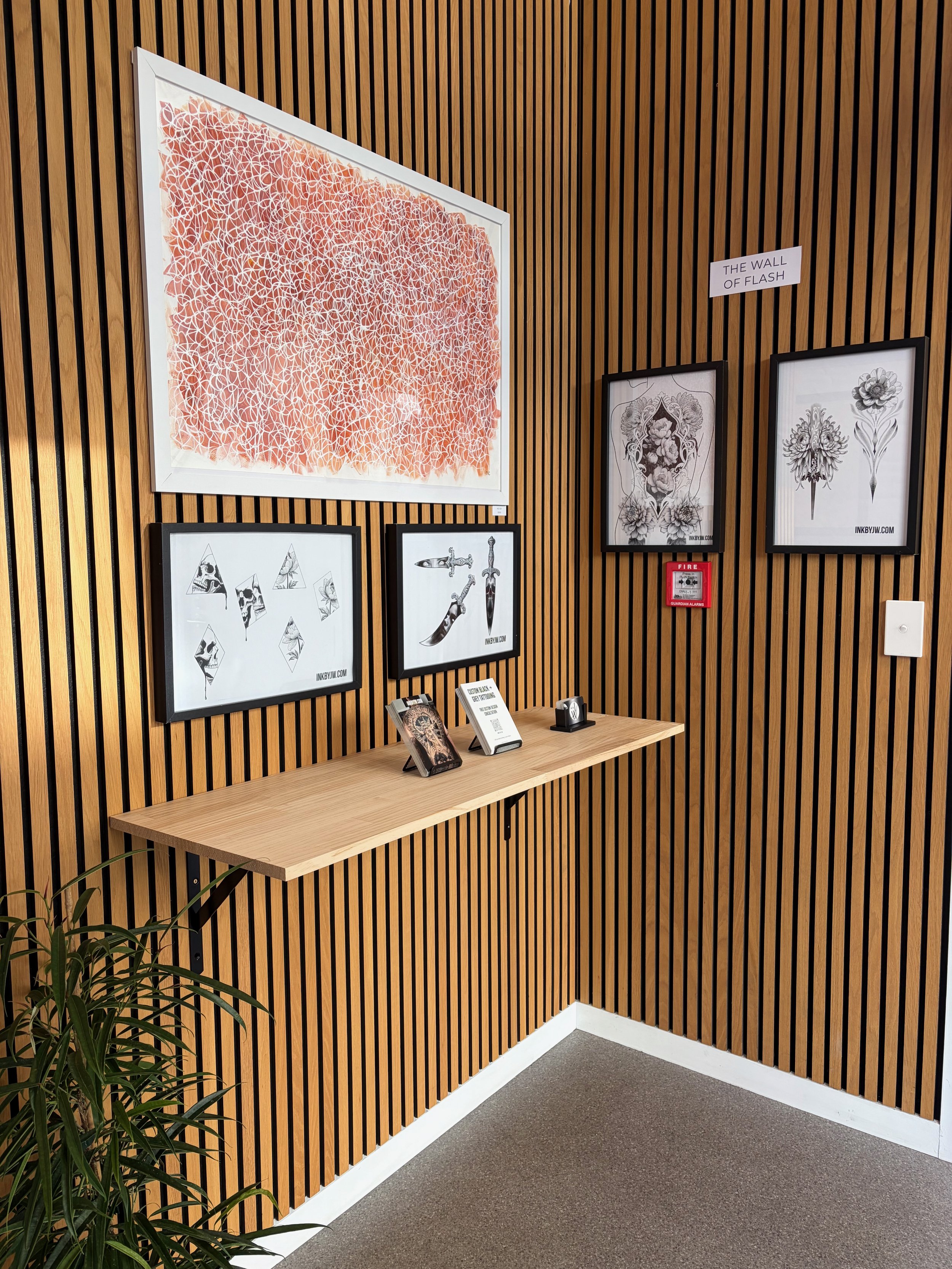 Interior of Paper & Skin Studio, a contemporary gallery and tattoo studio in Wellington.