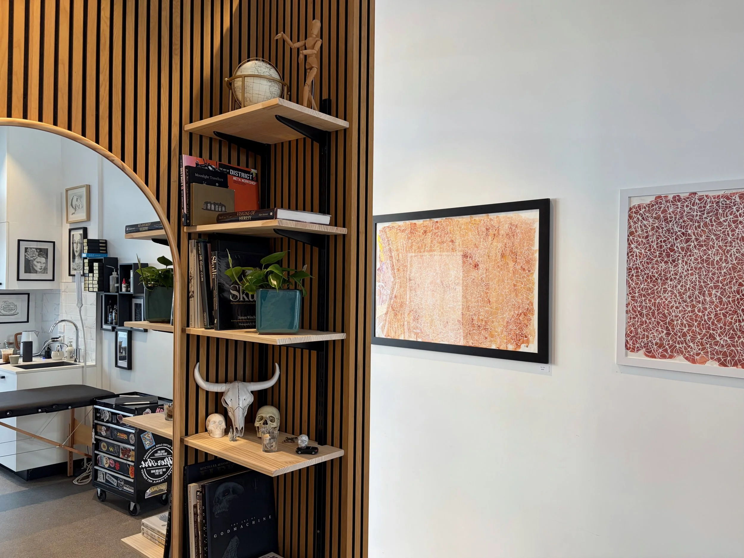 Waiting area inside Paper & Skin Studio gallery and tattoo studio in Te Aro.