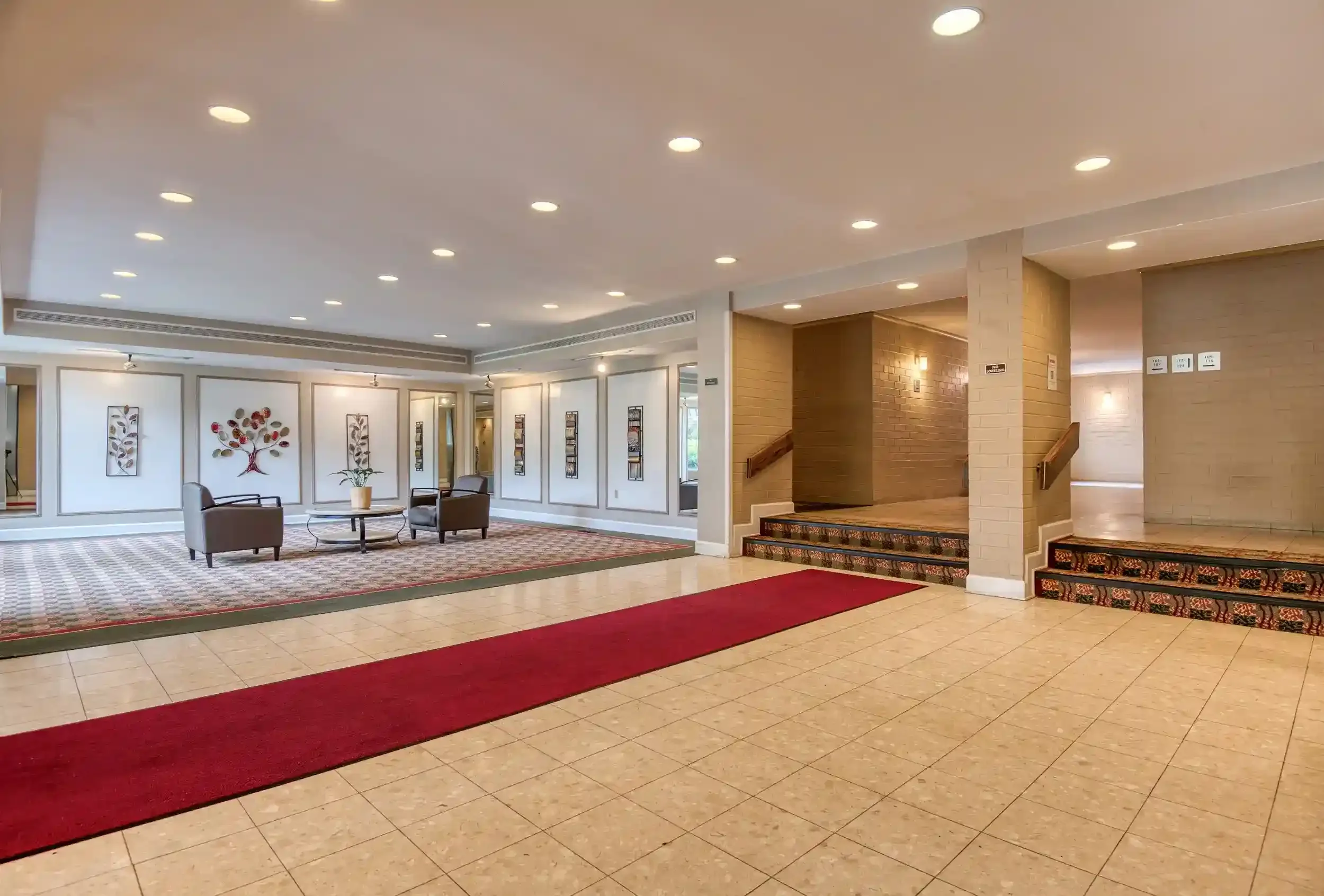 Lobby – The Arlington’s red carpet creates an elegant first impression for both residents and guests.